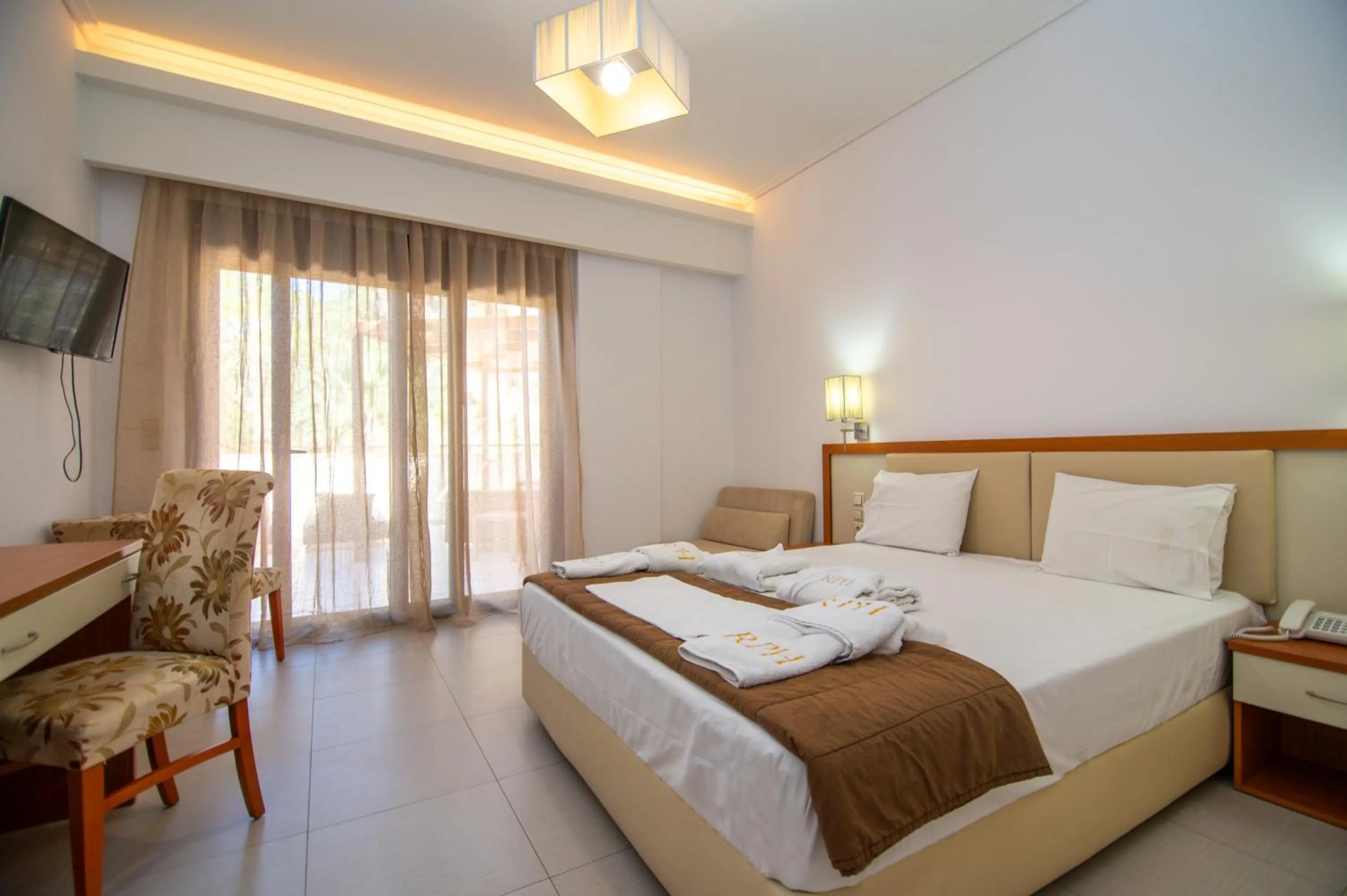 Bed in Riviera Perdika Hotel