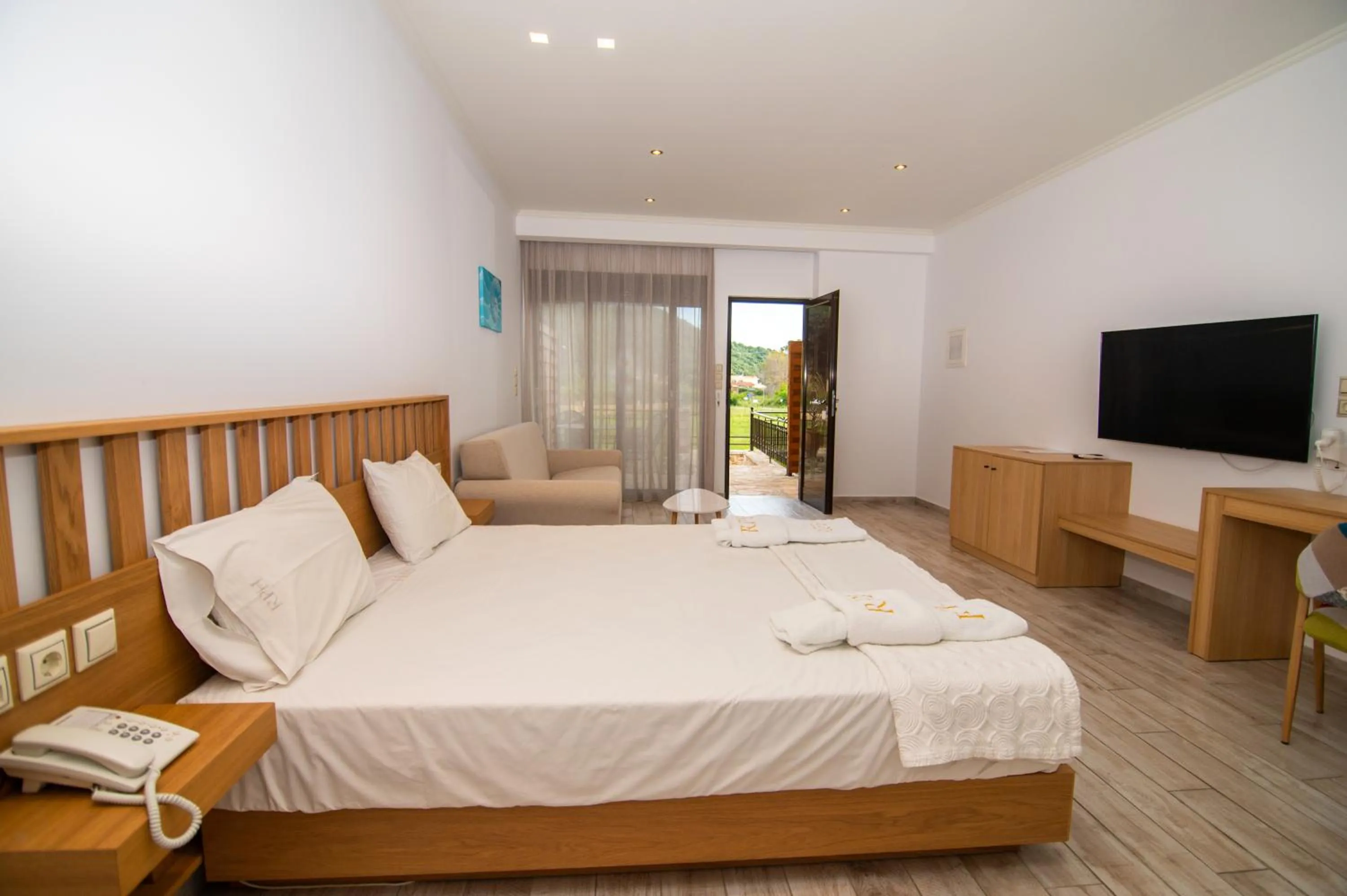 Bed in Riviera Perdika Hotel