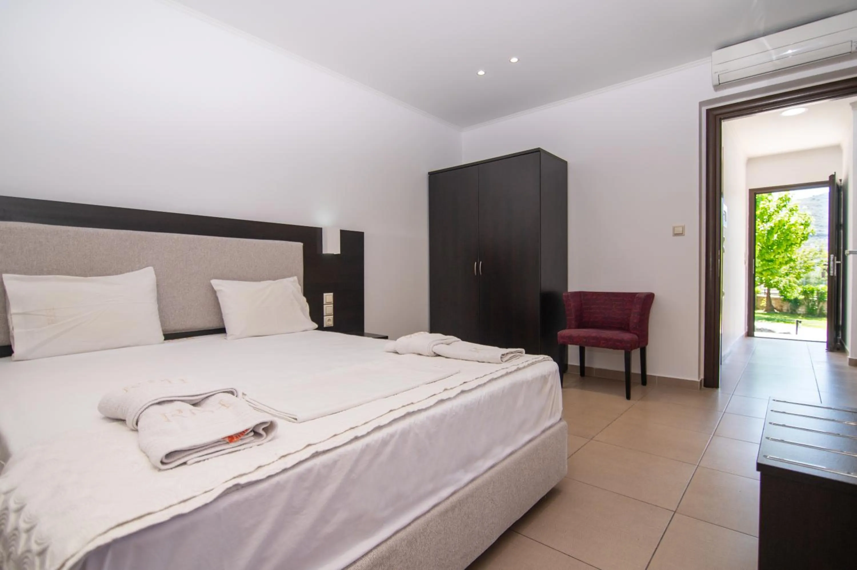 Bed in Riviera Perdika Hotel