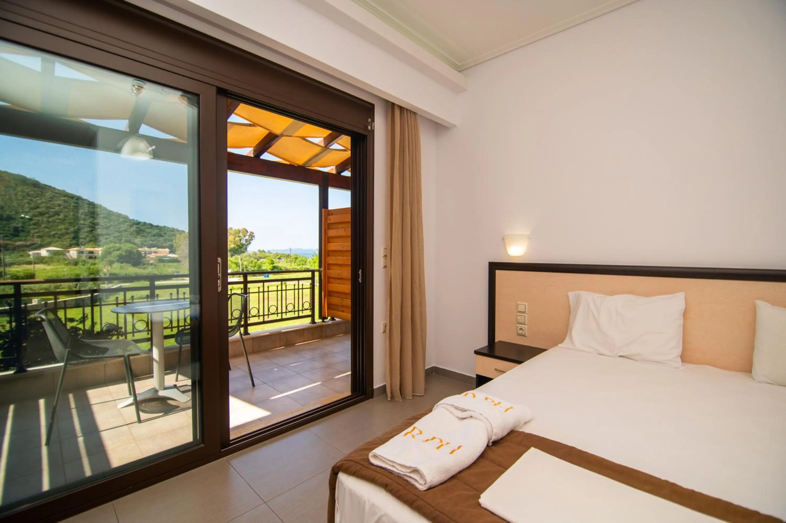 Bed in Riviera Perdika Hotel