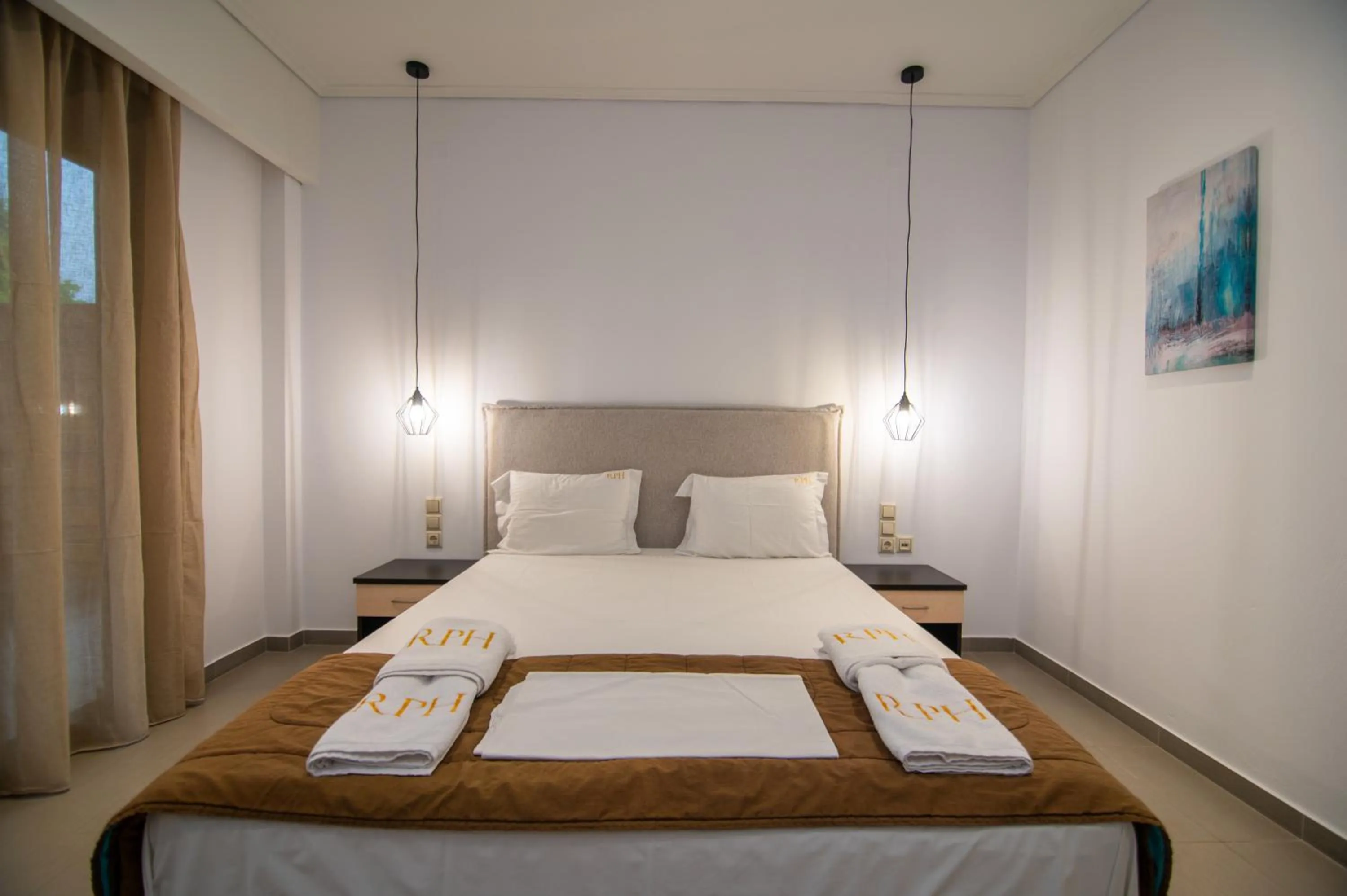 Bed in Riviera Perdika Hotel