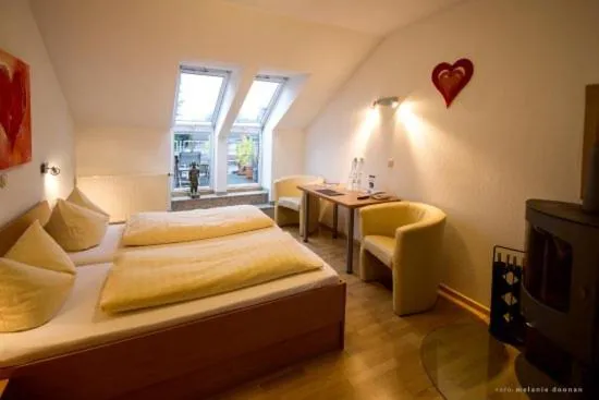 Photo of the whole room, Bed in Hotel-Restaurant Haus Berger