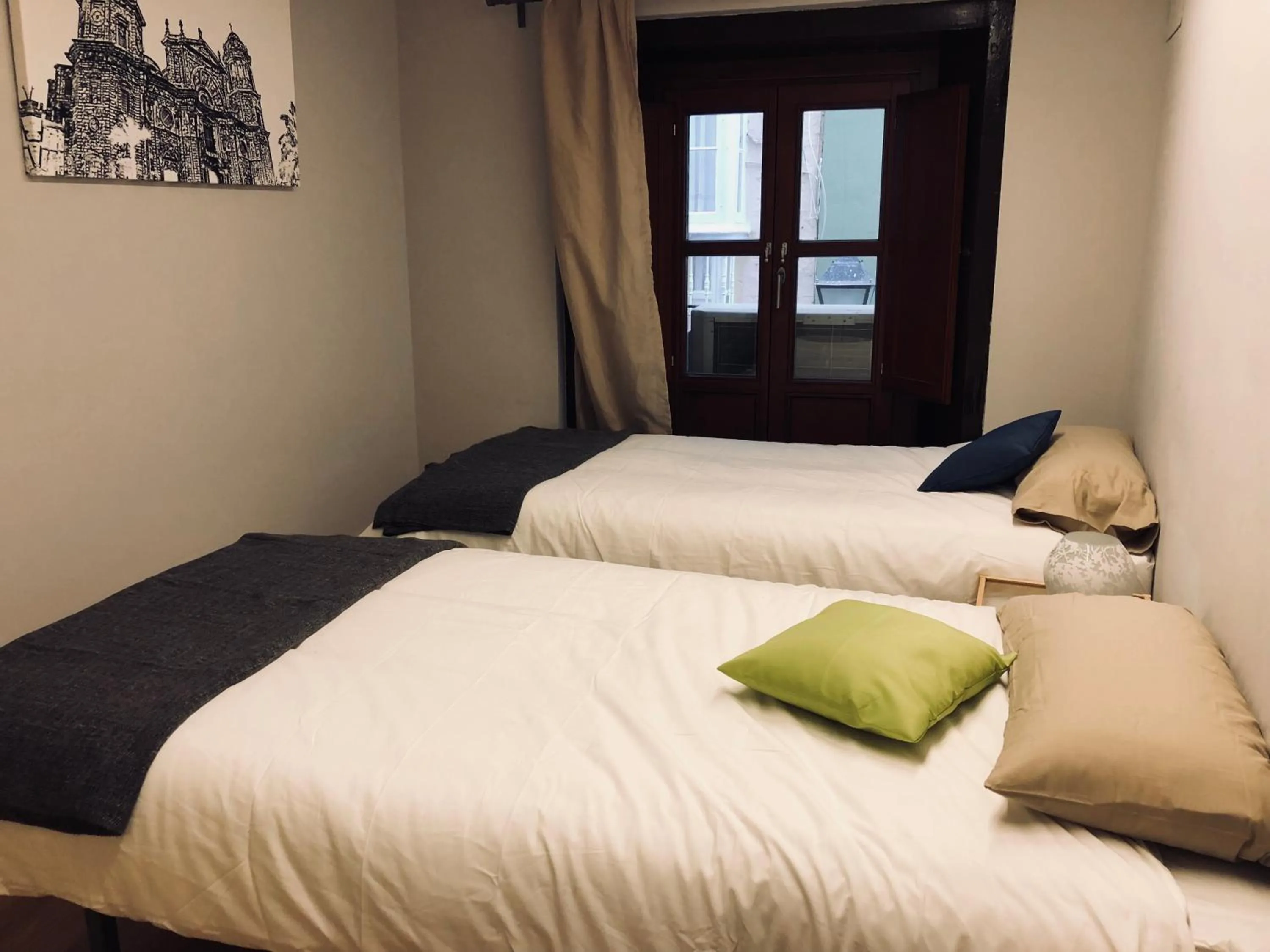 Bed in Apodaca Rooms