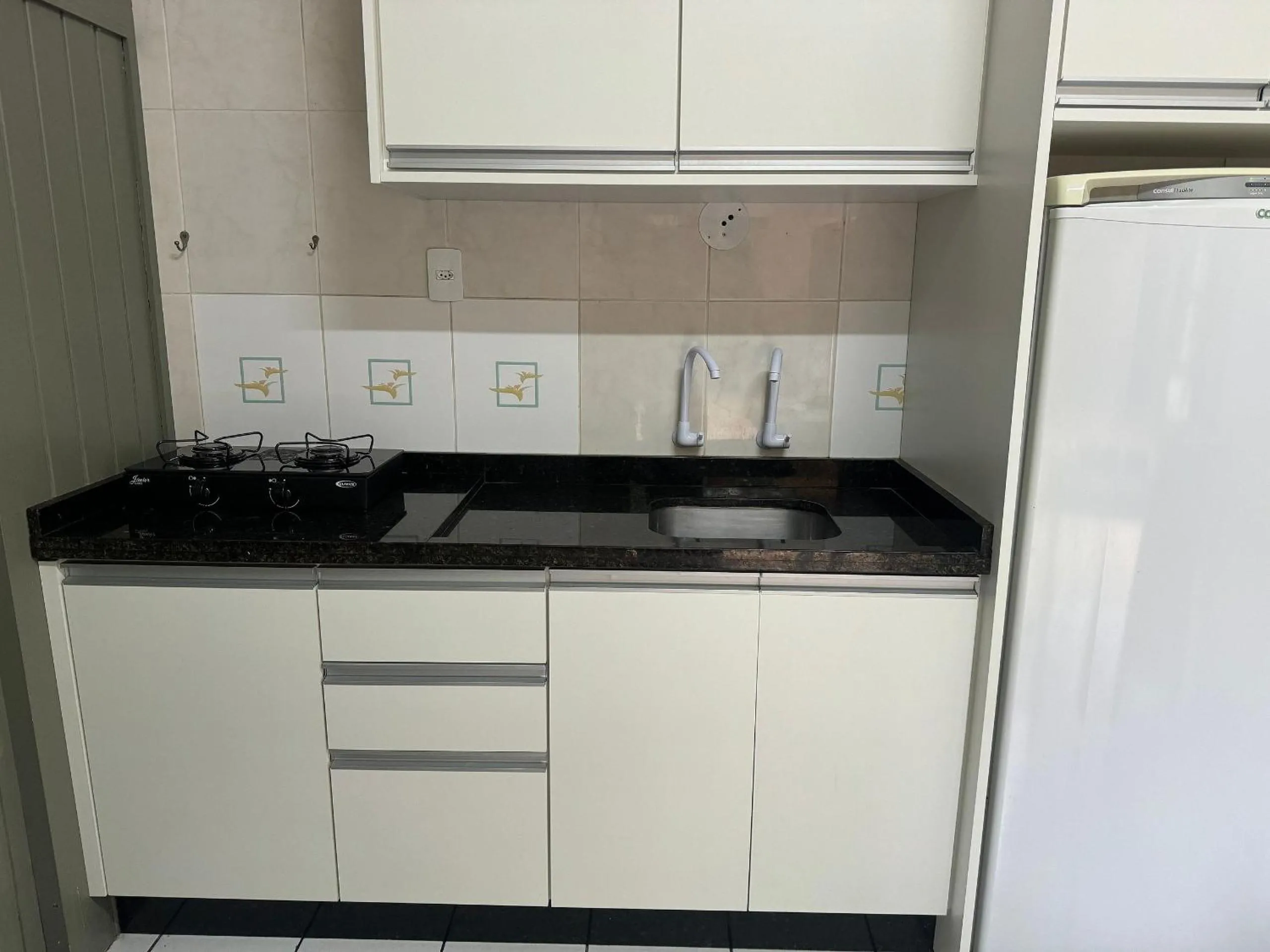 Kitchen or kitchenette in Residencial Glaura é Destino Floripa