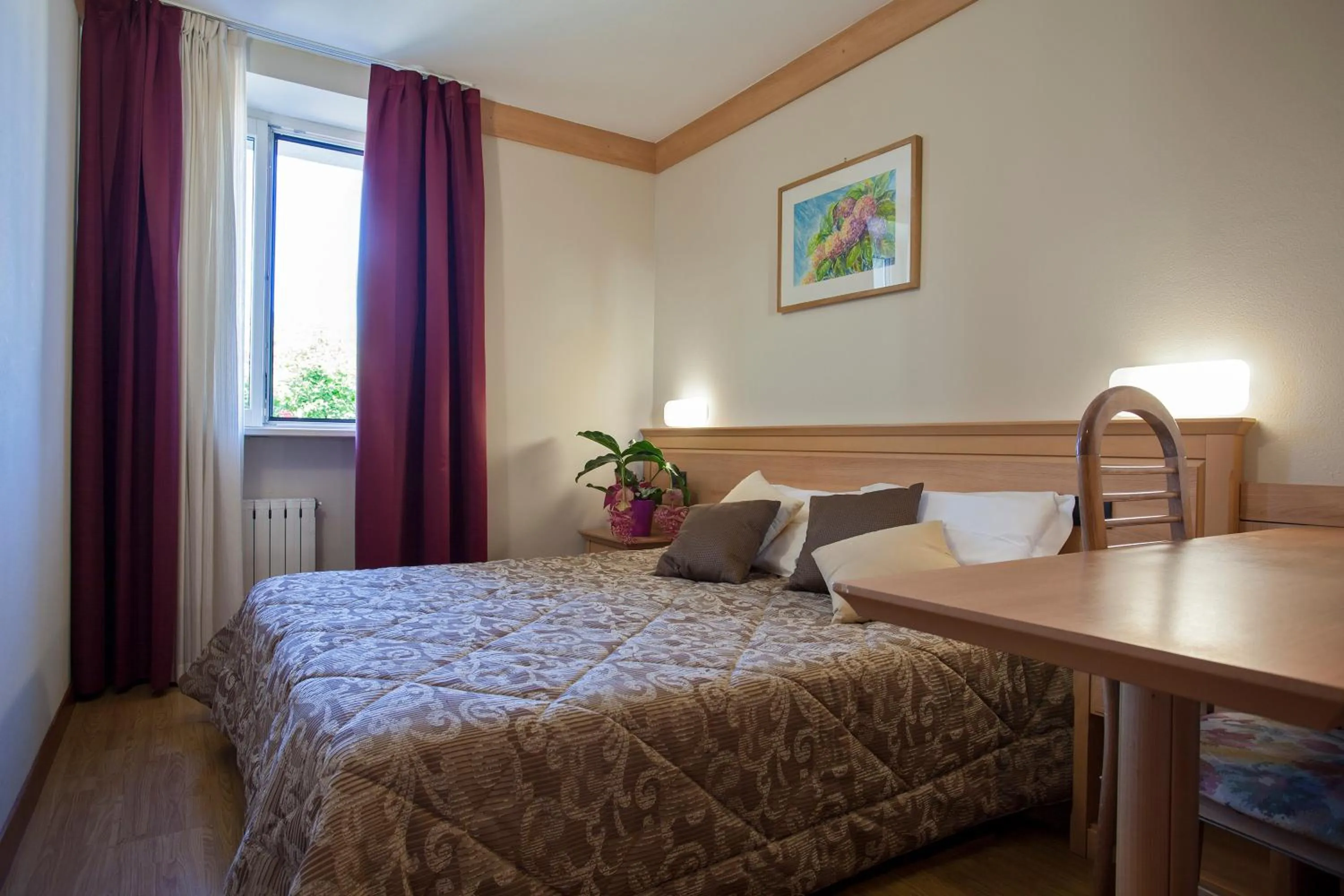 Bed in Hotel Vittoria