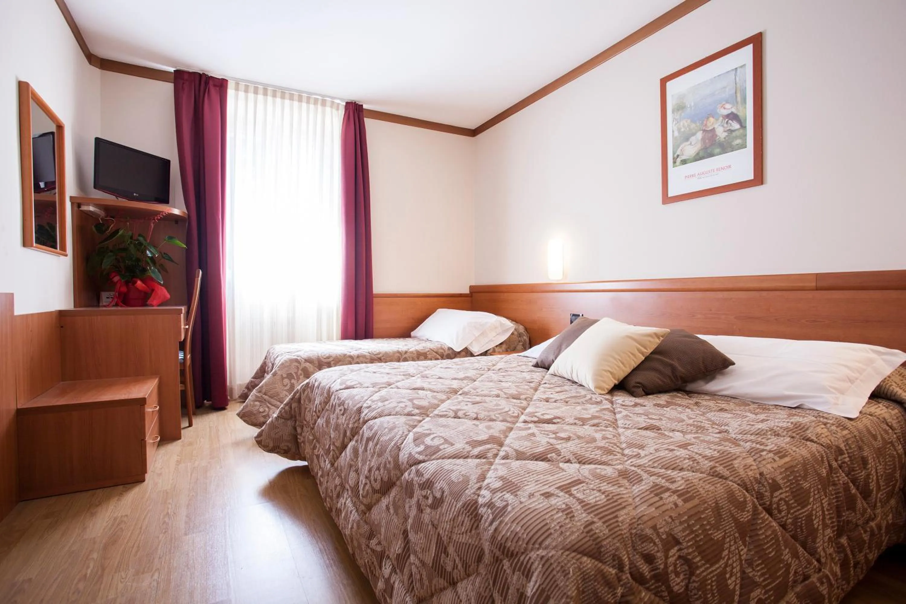 Bed in Hotel Vittoria