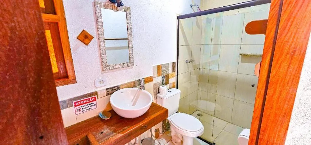 Bathroom in Cores e Flores da Serra Pousada by Concavus