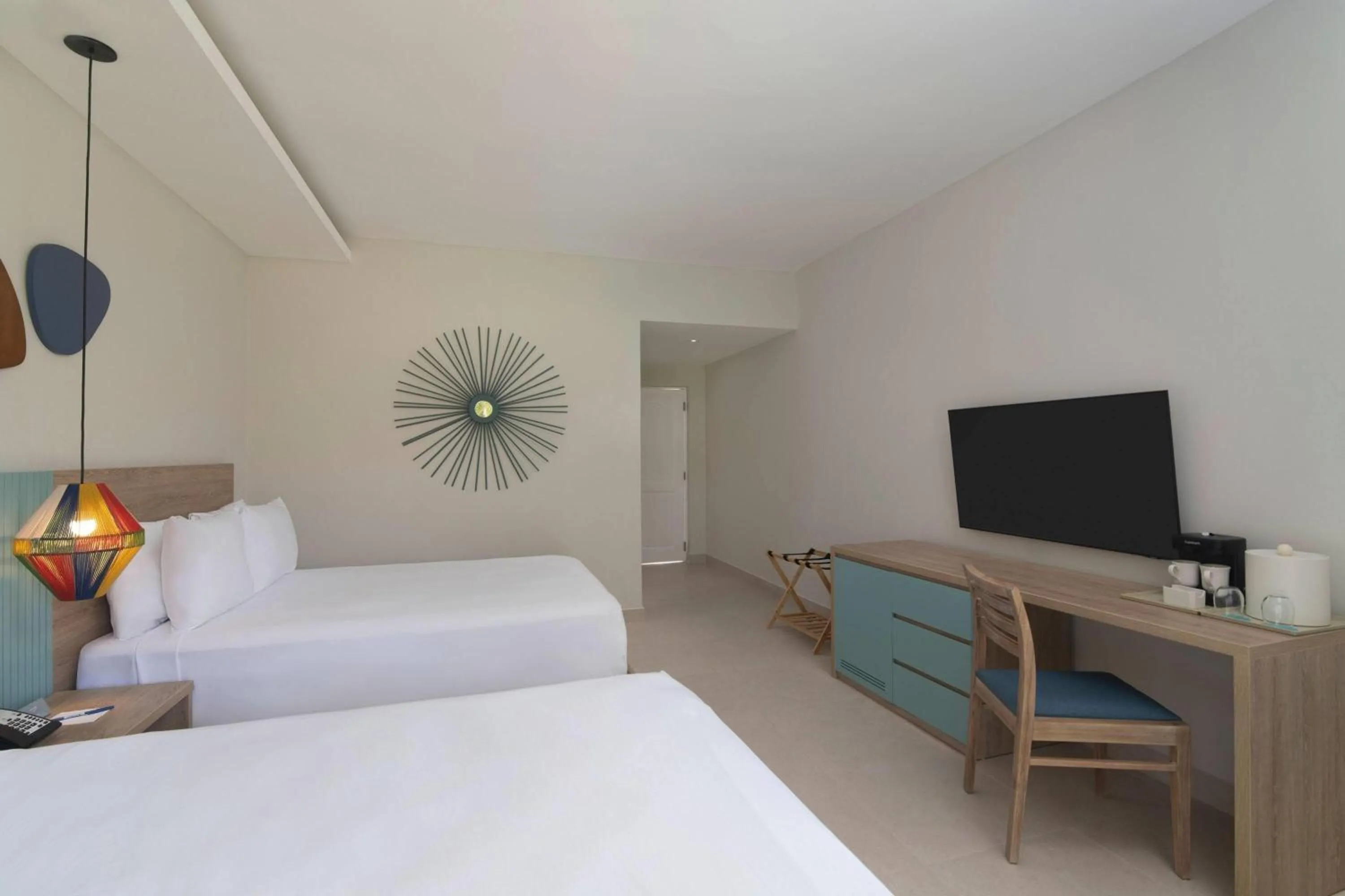 Photo of the whole room, Bed in Wyndham Alltra Samana All Inclusive Resort