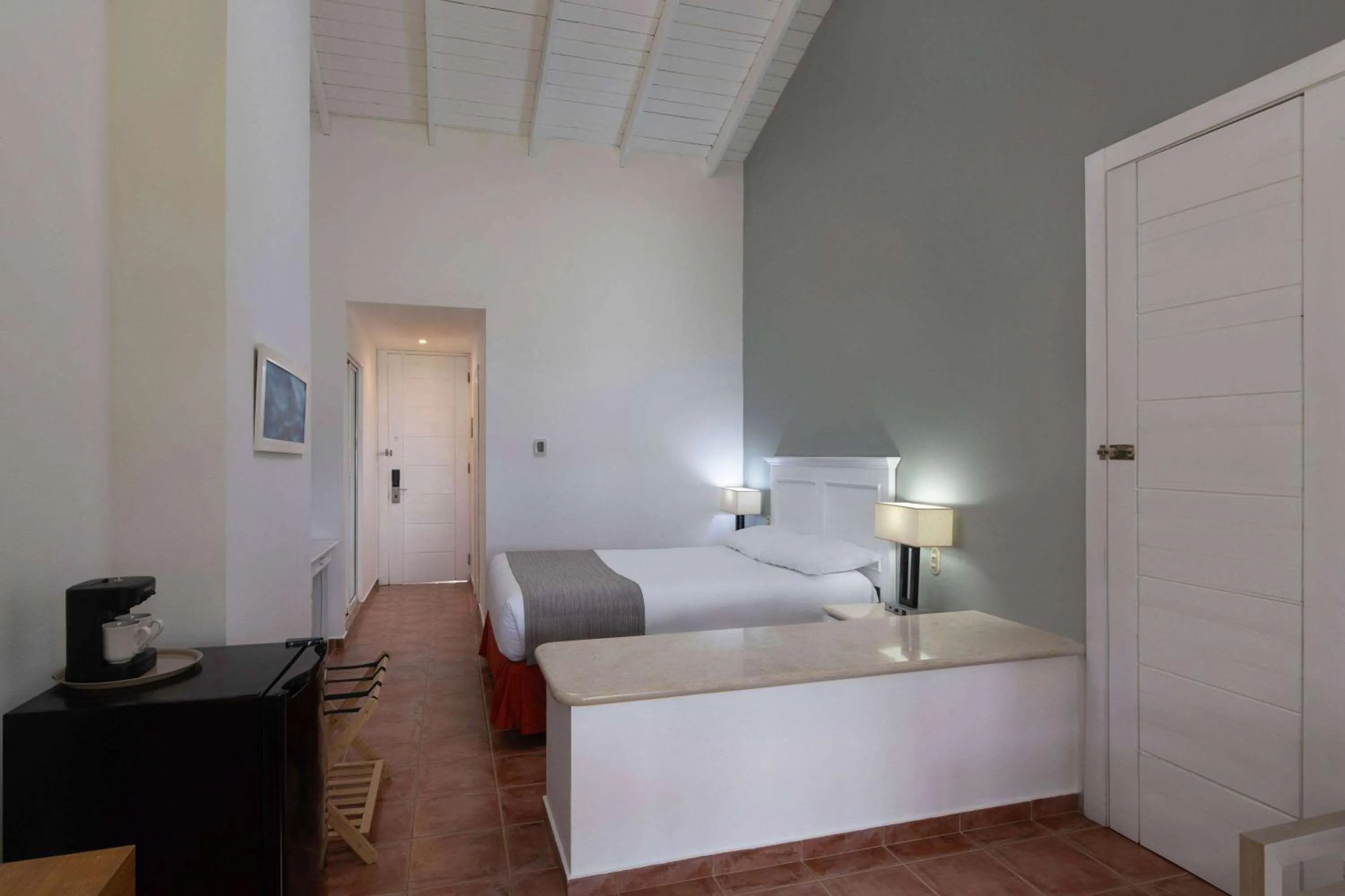 Photo of the whole room, Bed in Wyndham Alltra Samana All Inclusive Resort