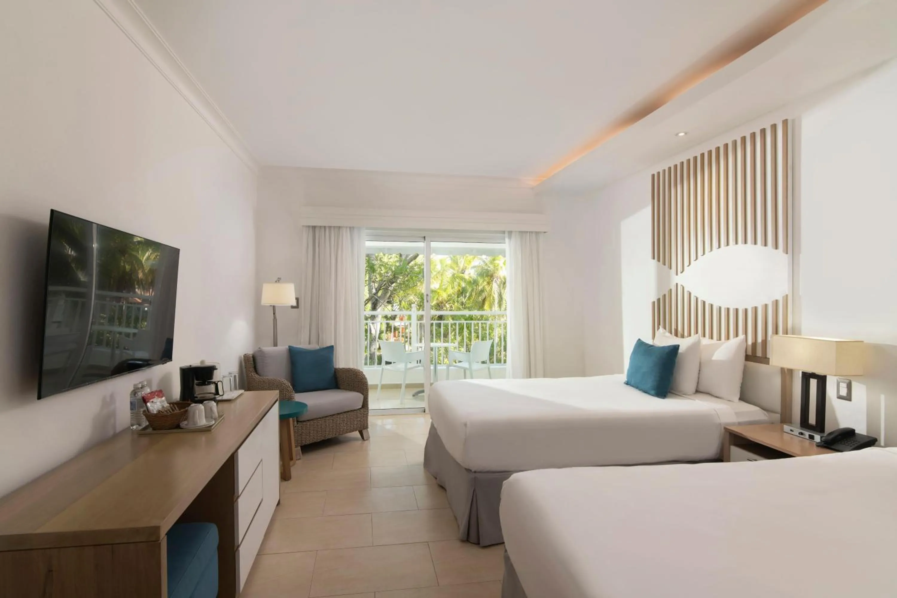 Photo of the whole room, Bed in Wyndham Alltra Samana All Inclusive Resort