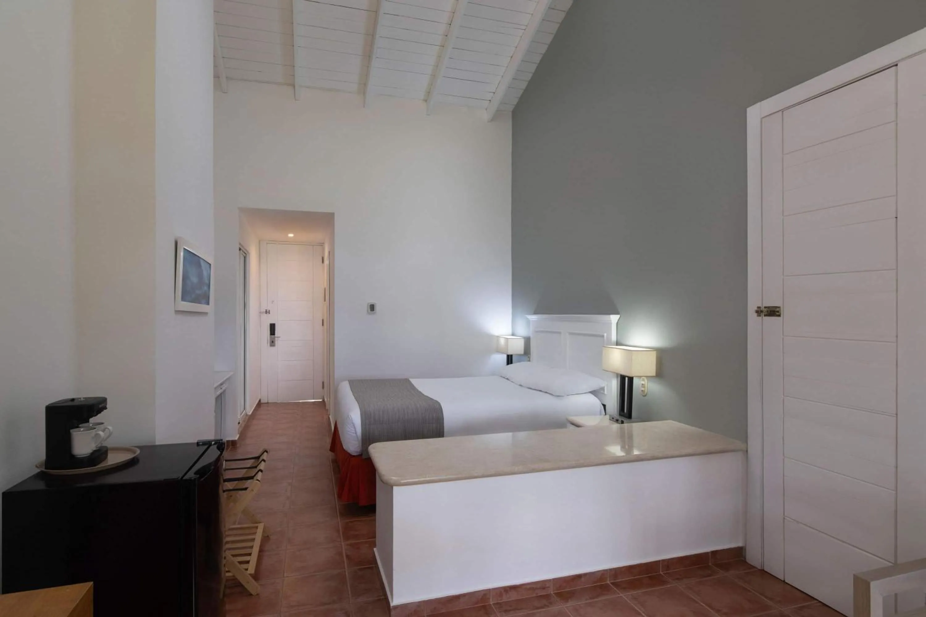 Photo of the whole room, Bed in Wyndham Alltra Samana All Inclusive Resort