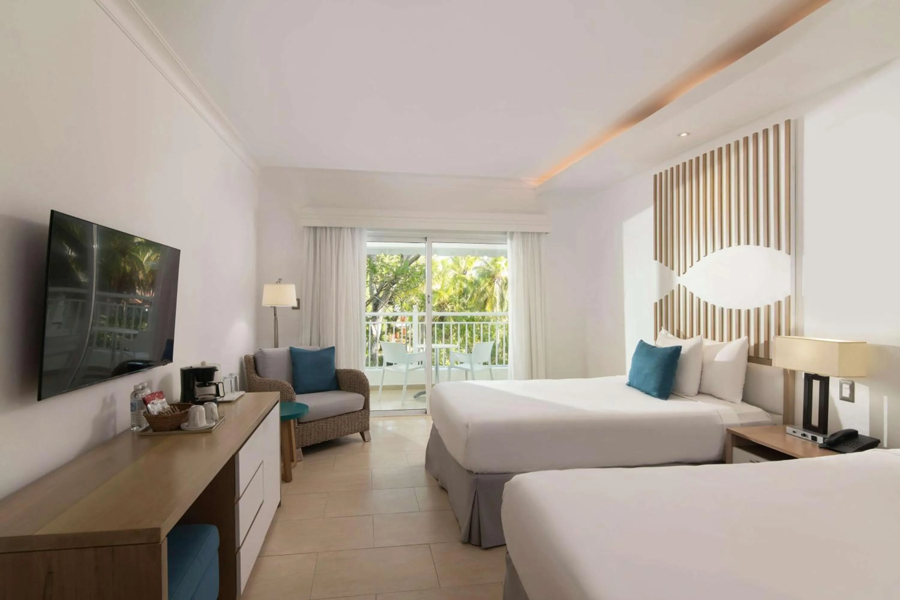 Photo of the whole room, Bed in Wyndham Alltra Samana All Inclusive Resort