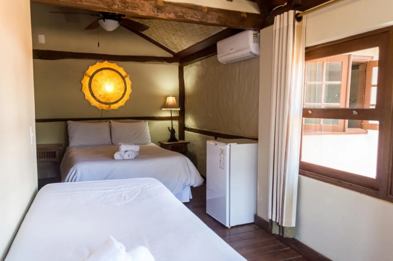 Bed in Pousada Papyrus