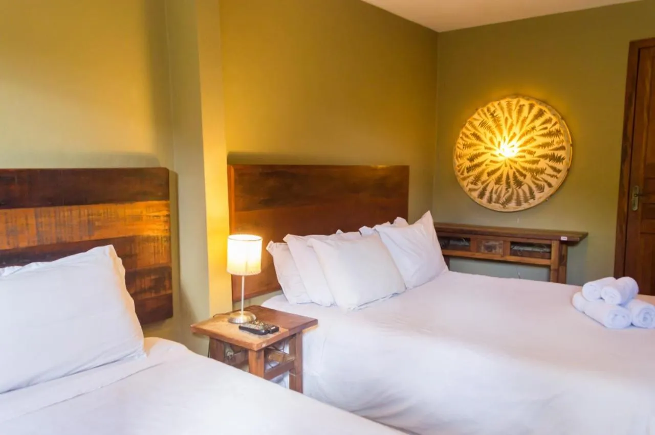 Bed in Pousada Papyrus