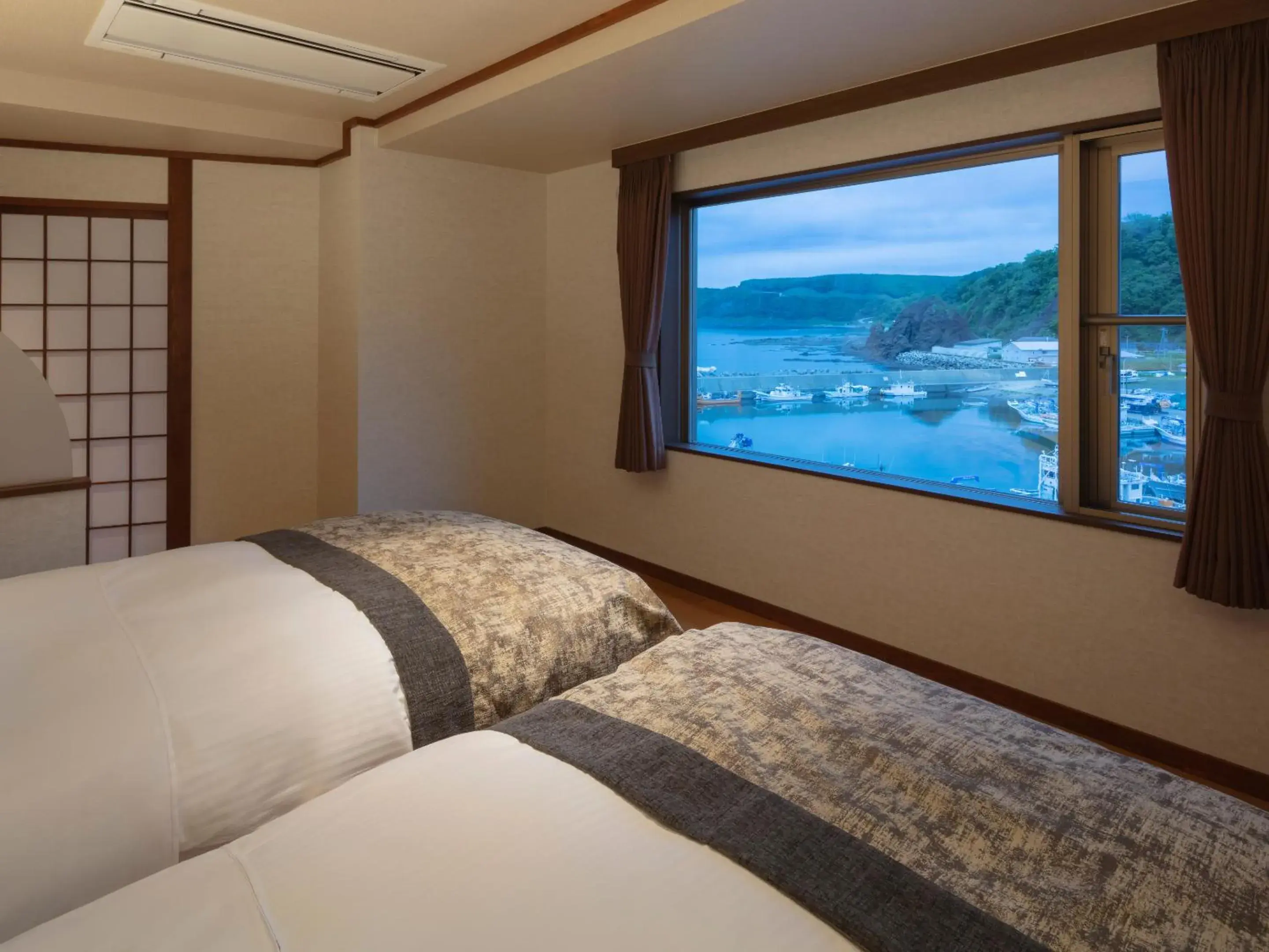 Bedroom, Bed in Kitakobushi Shiretoko Hotel & Resort Bedroom, Bed in Kitakobushi Shiretoko Hotel & Resort