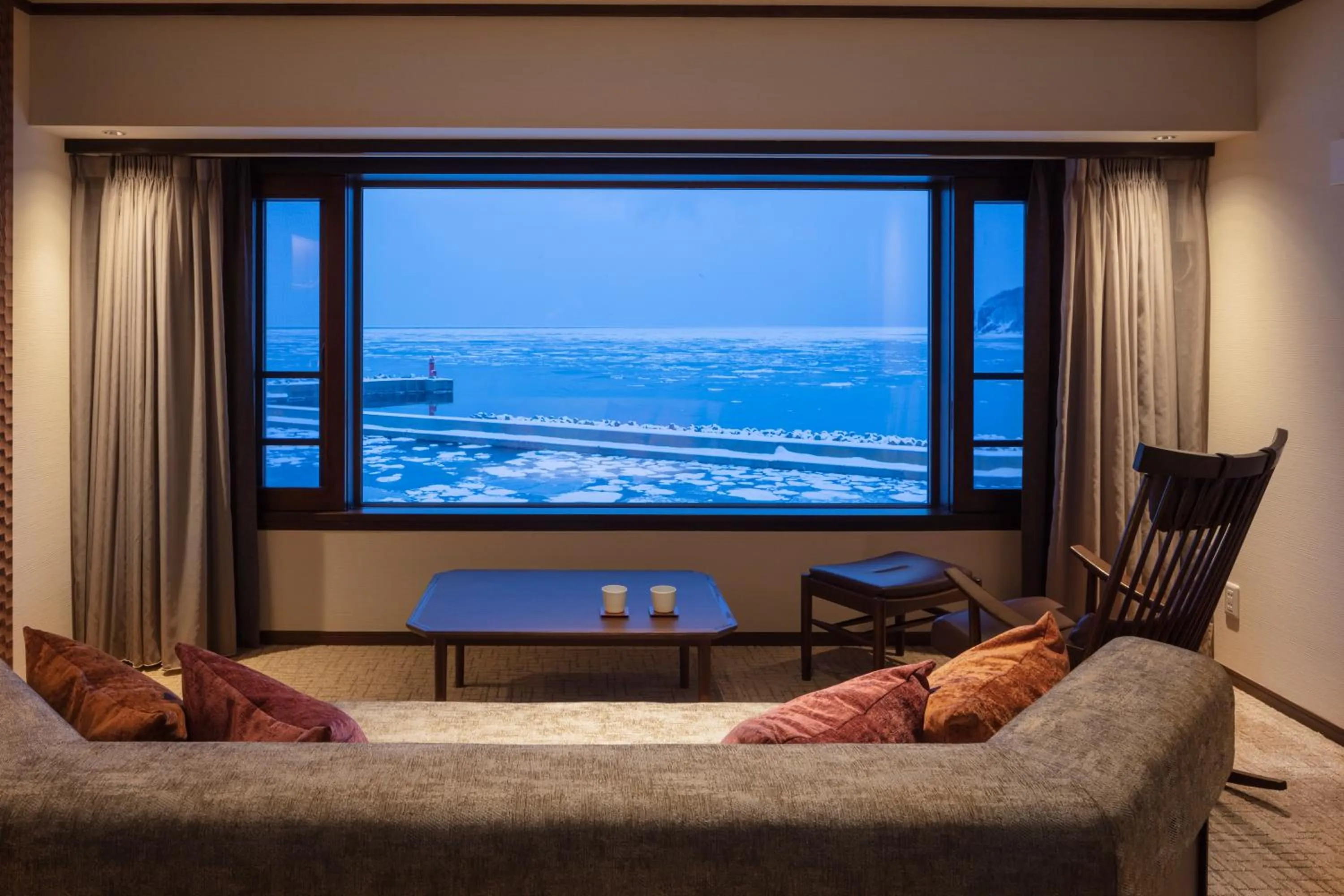 Living room, Bed in Kitakobushi Shiretoko Hotel & Resort