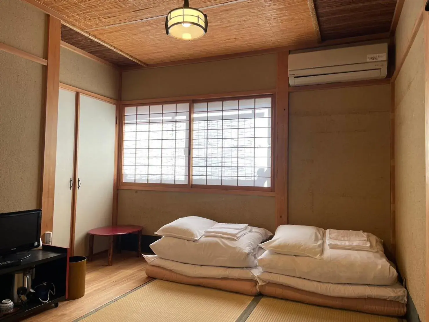 Photo of the whole room, Bed in Nagomi-Ryokan Yuu Photo of the whole room, Bed in Nagomi-Ryokan Yuu