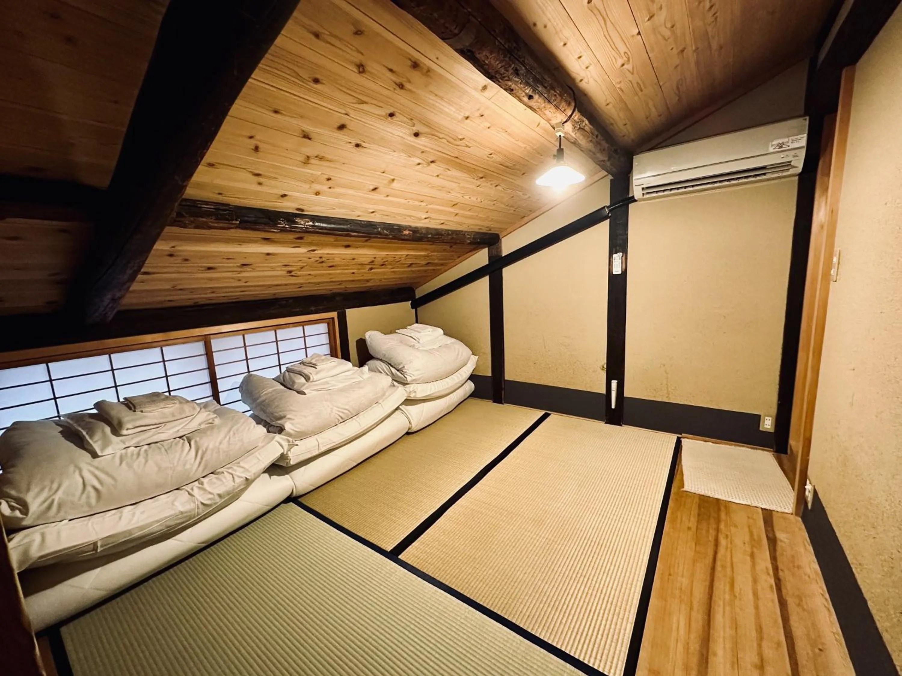 Bed in Nagomi-Ryokan Yuu