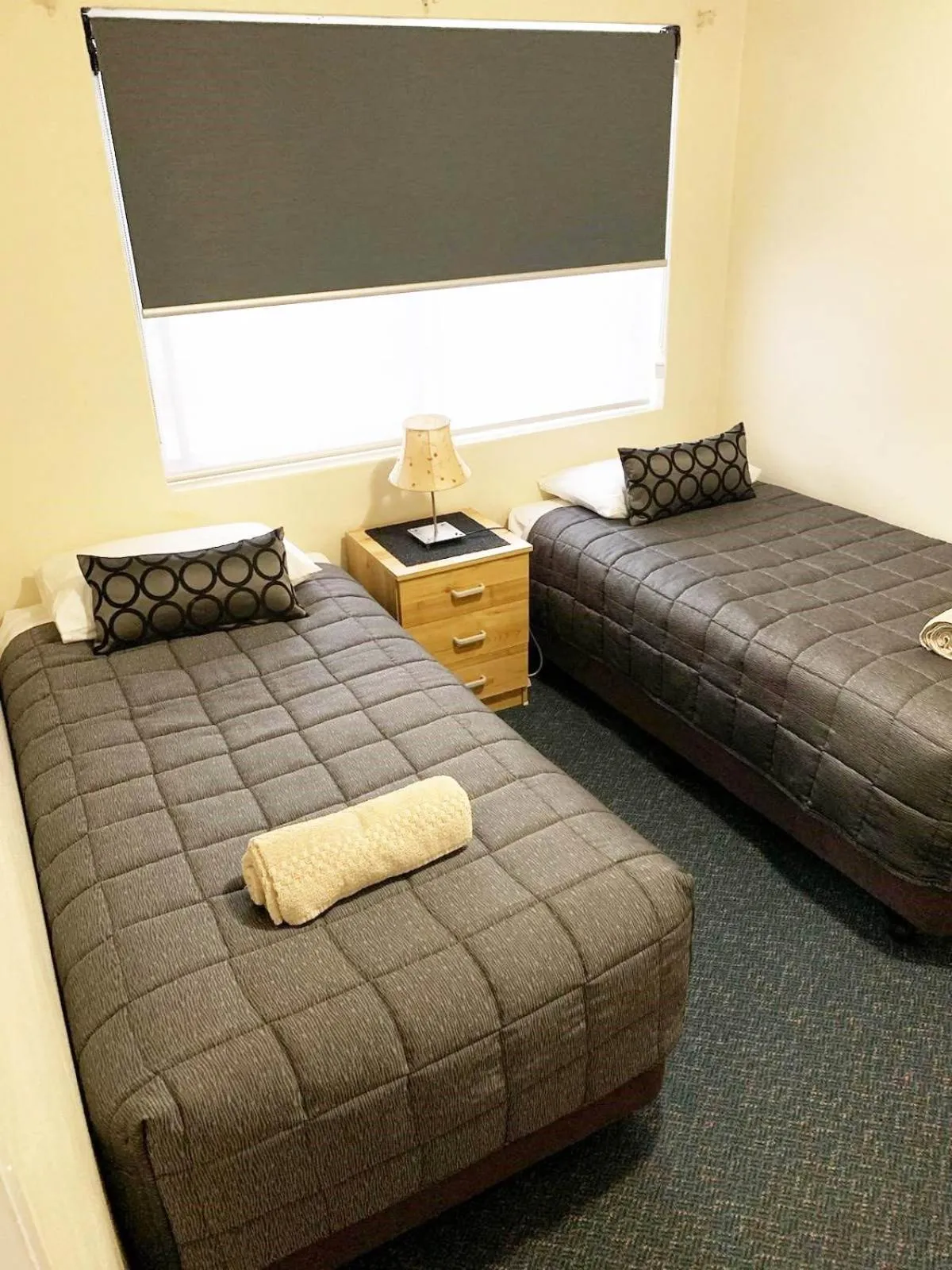 Bed in Westwood Motor Inn