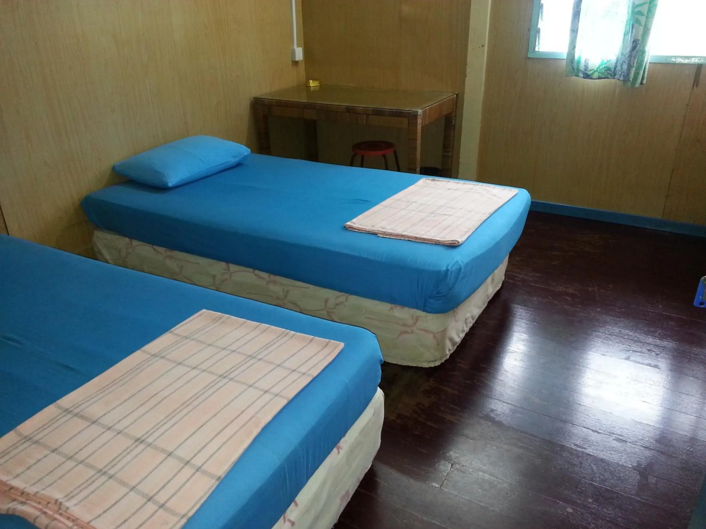 Bed in Baba's Guest House By The Sea Bed in Baba's Guest House By The Sea