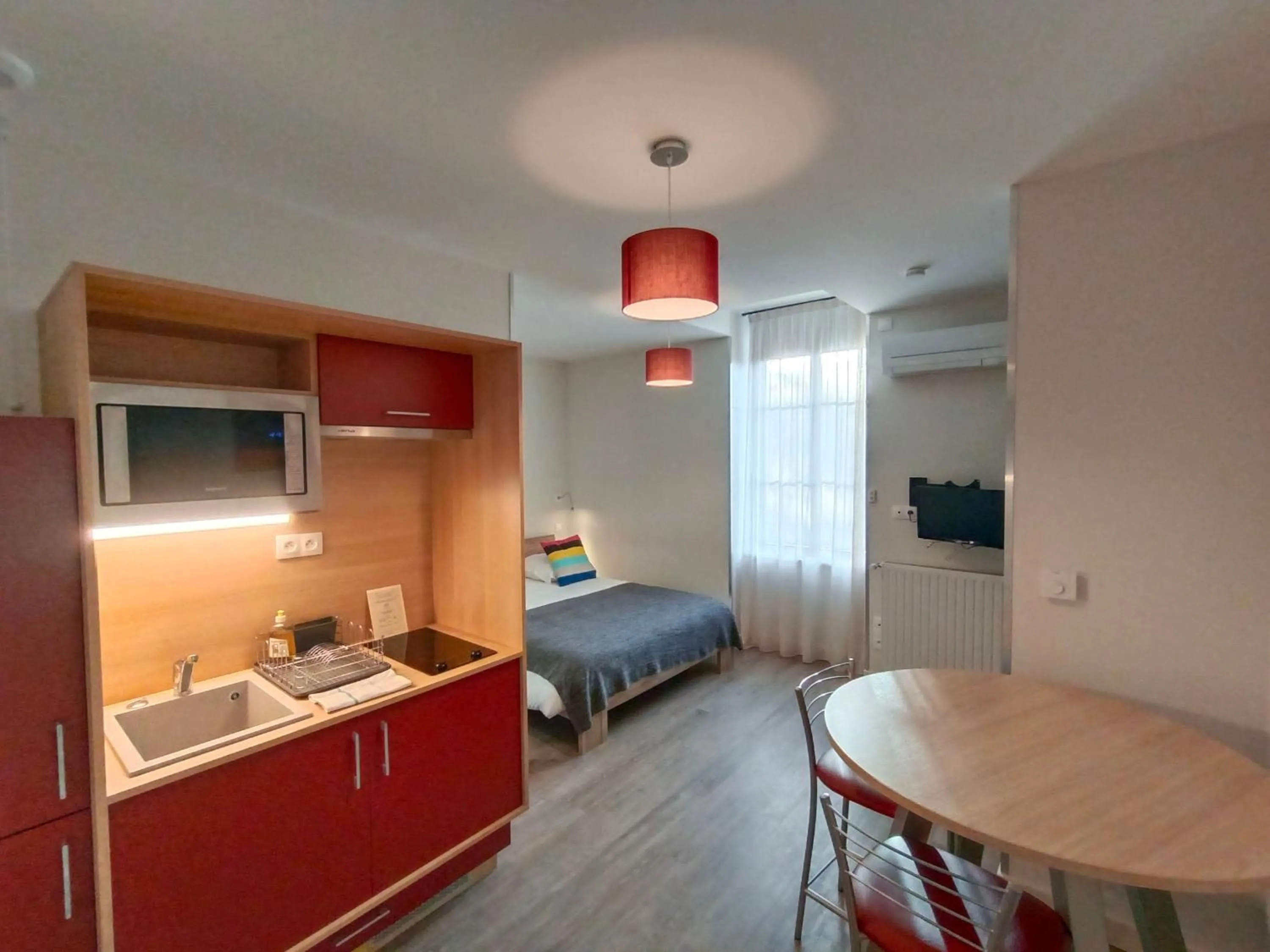 Bed in Appart'Hotel Parc Johan