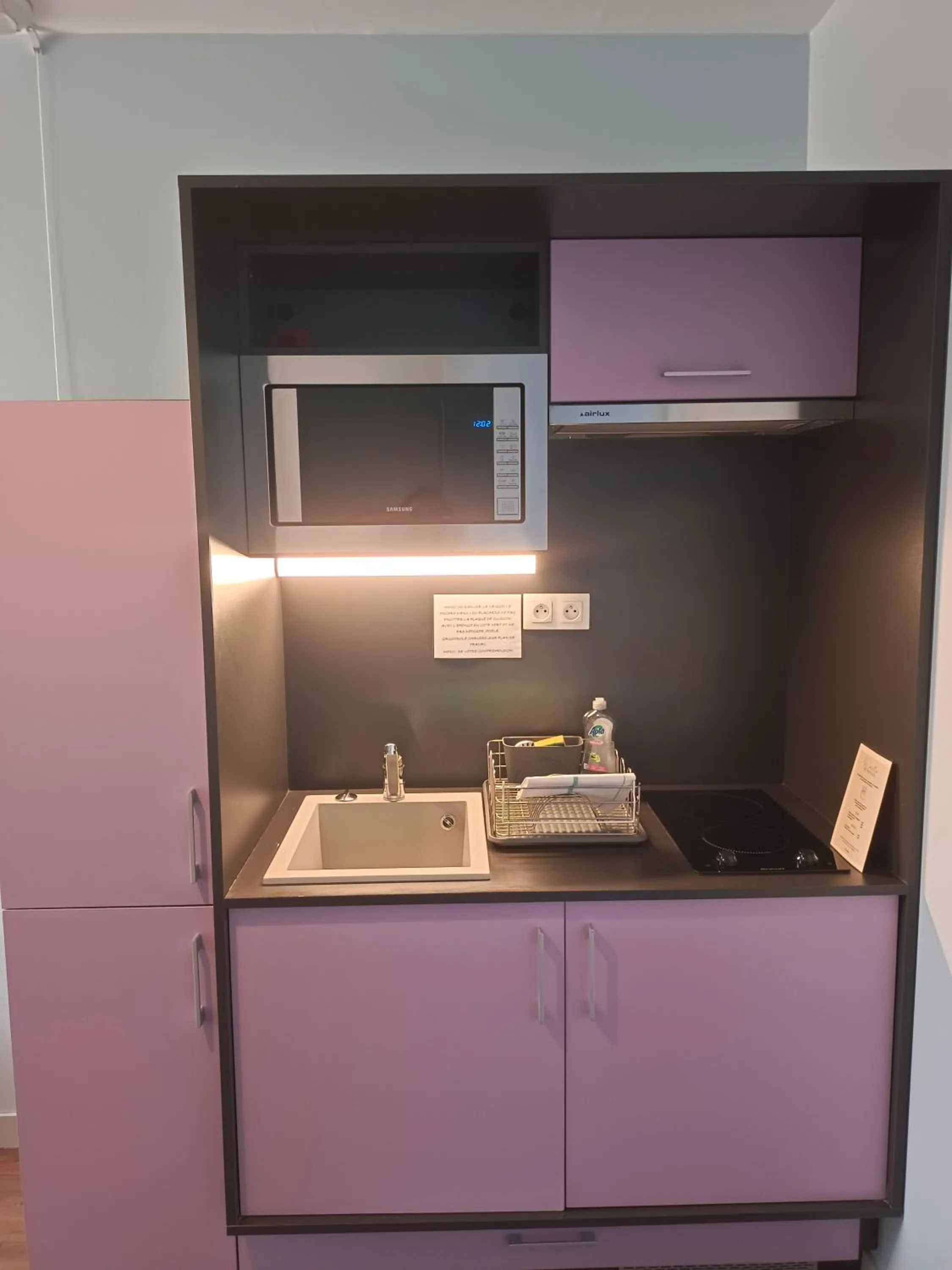 Kitchen or kitchenette in Appart'Hotel Parc Johan