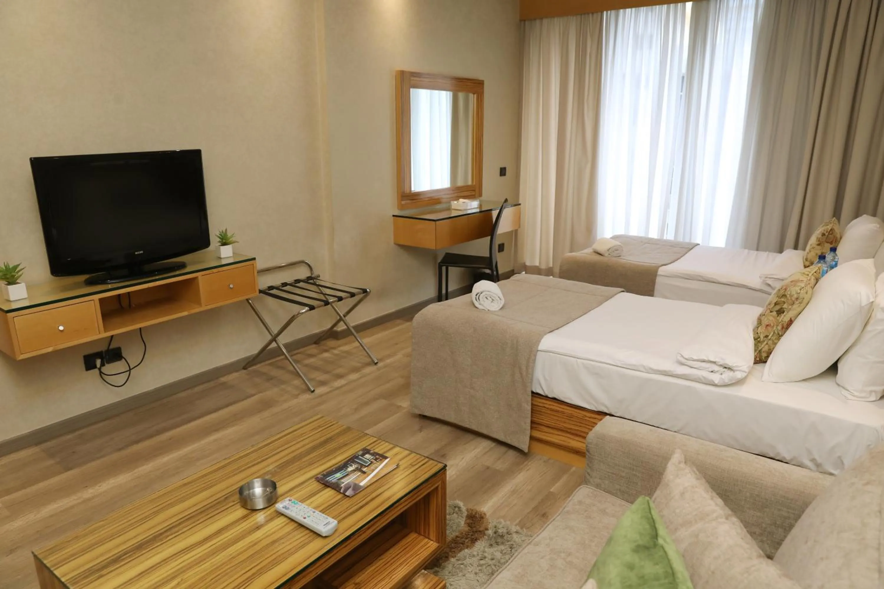 Photo of the whole room, Bed in Imperial Suites Hotel