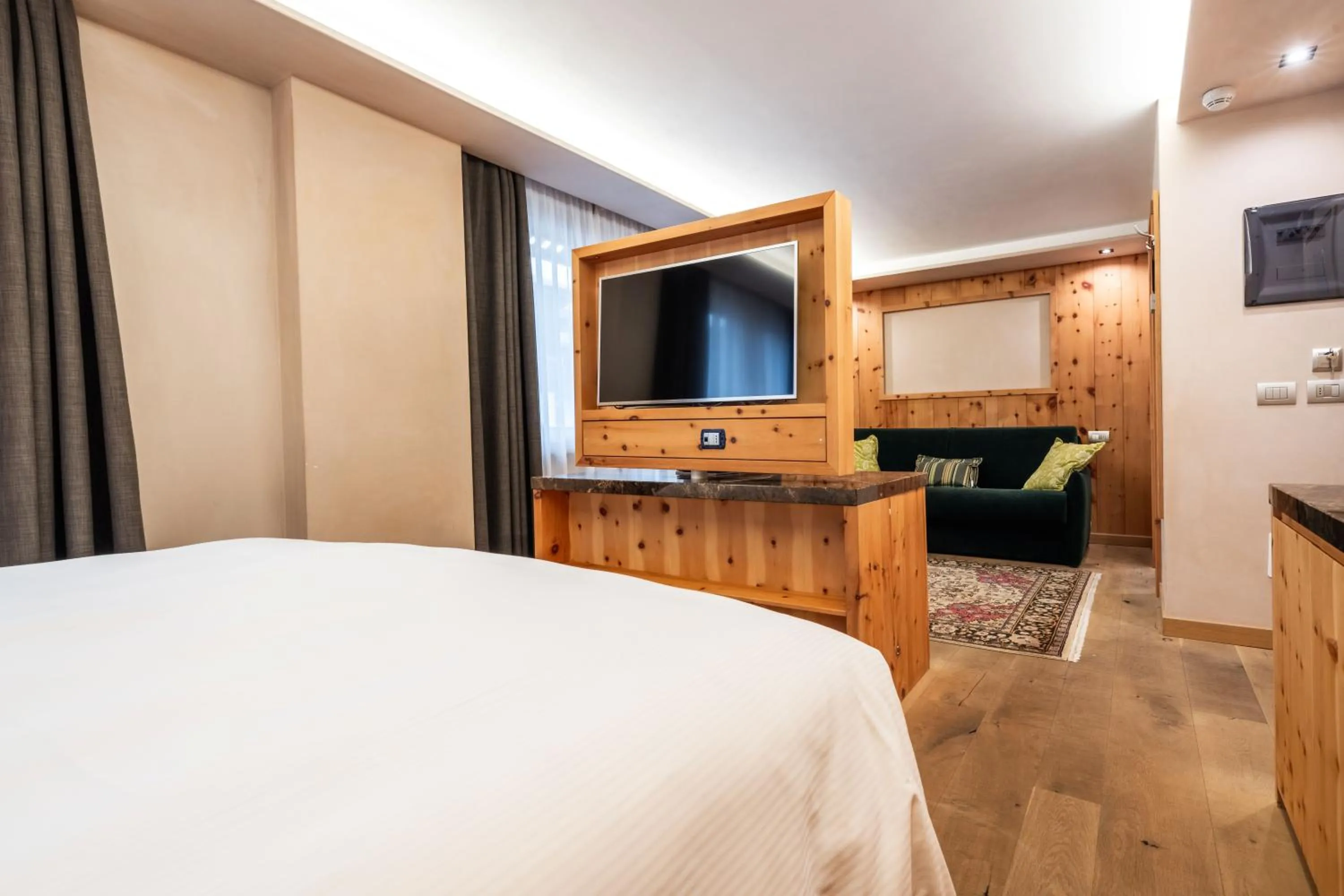 Living room, Bed in Hotel St. Michael