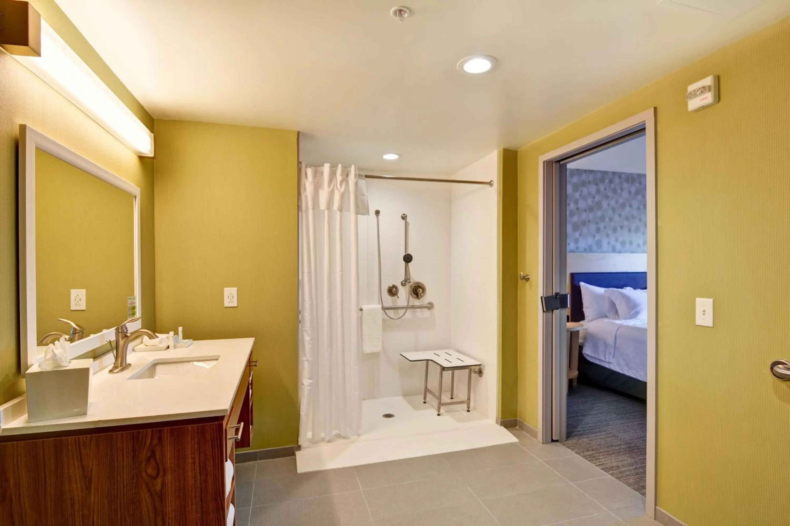 Bathroom, Bed in Home2 Suites By Hilton Winston-Salem Hanes Mall