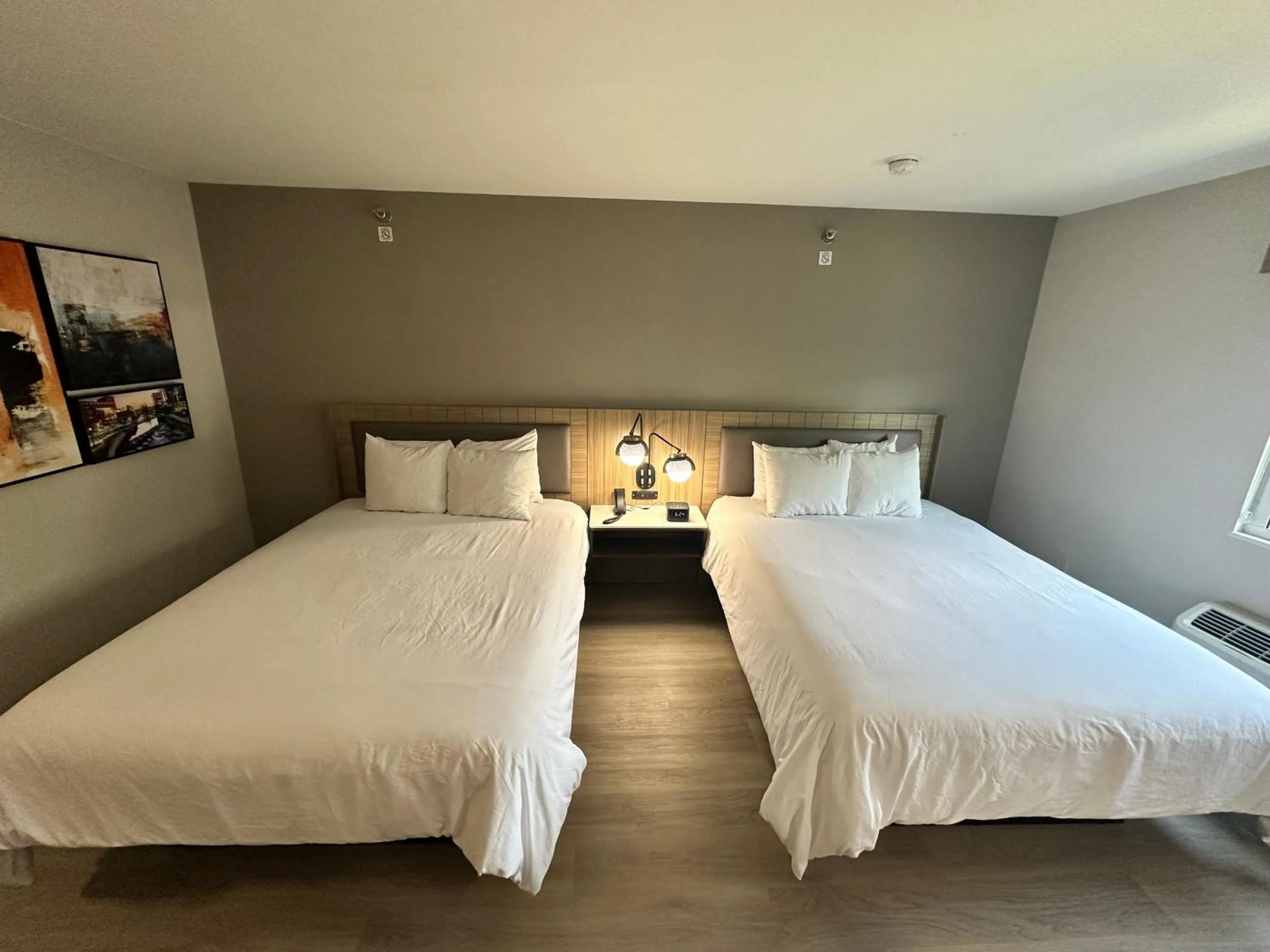 Bedroom, Bed in Midtown Suites - Greenville