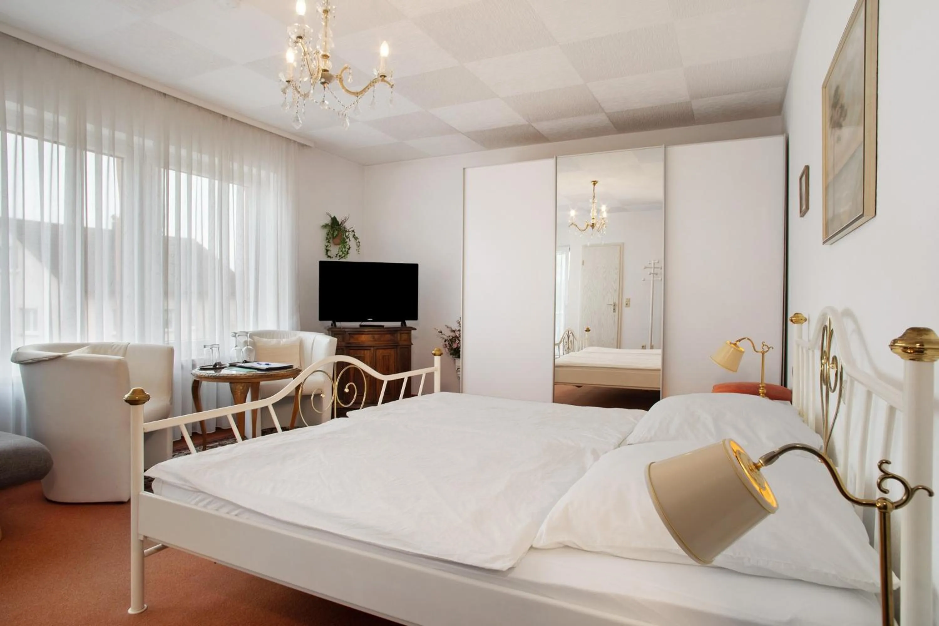 Living room, Bed in Hotel Garni Vitamari