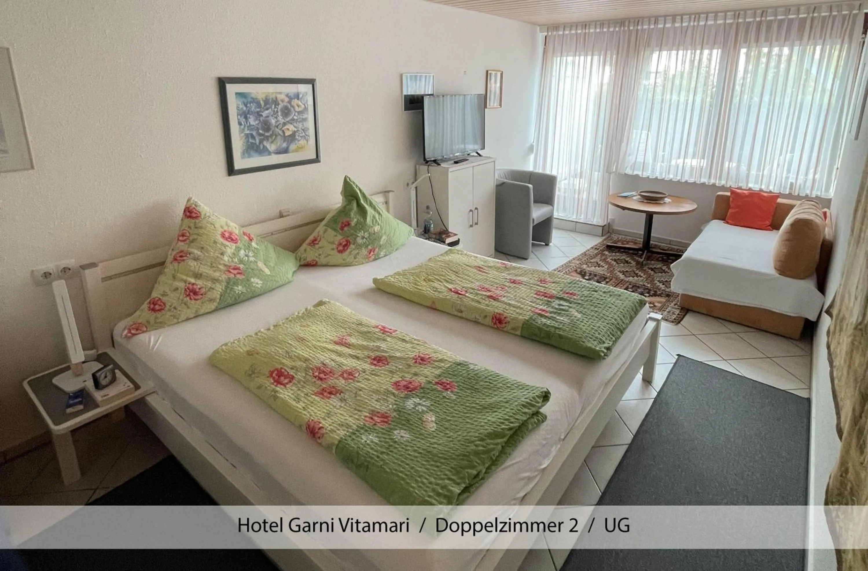 Living room, Bed in Hotel Garni Vitamari