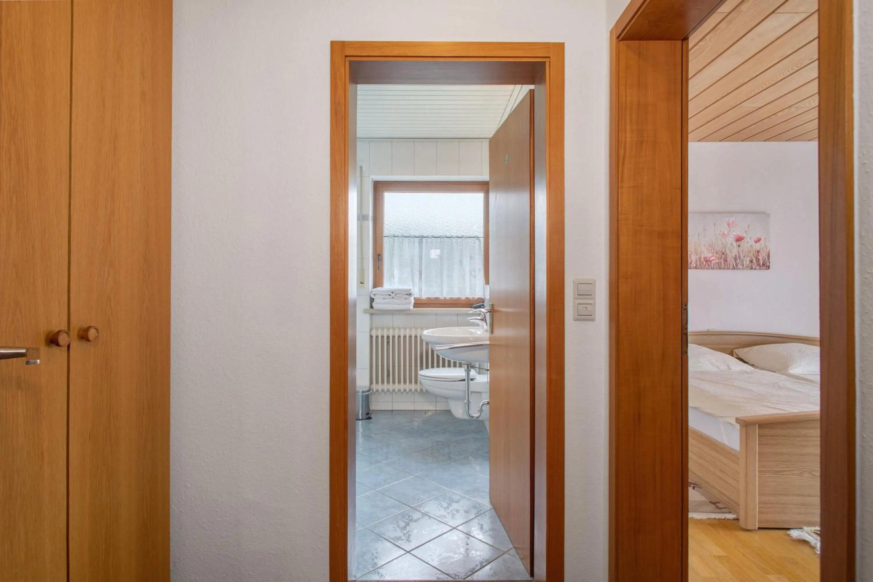 Living room, Bed in Hotel Garni Vitamari