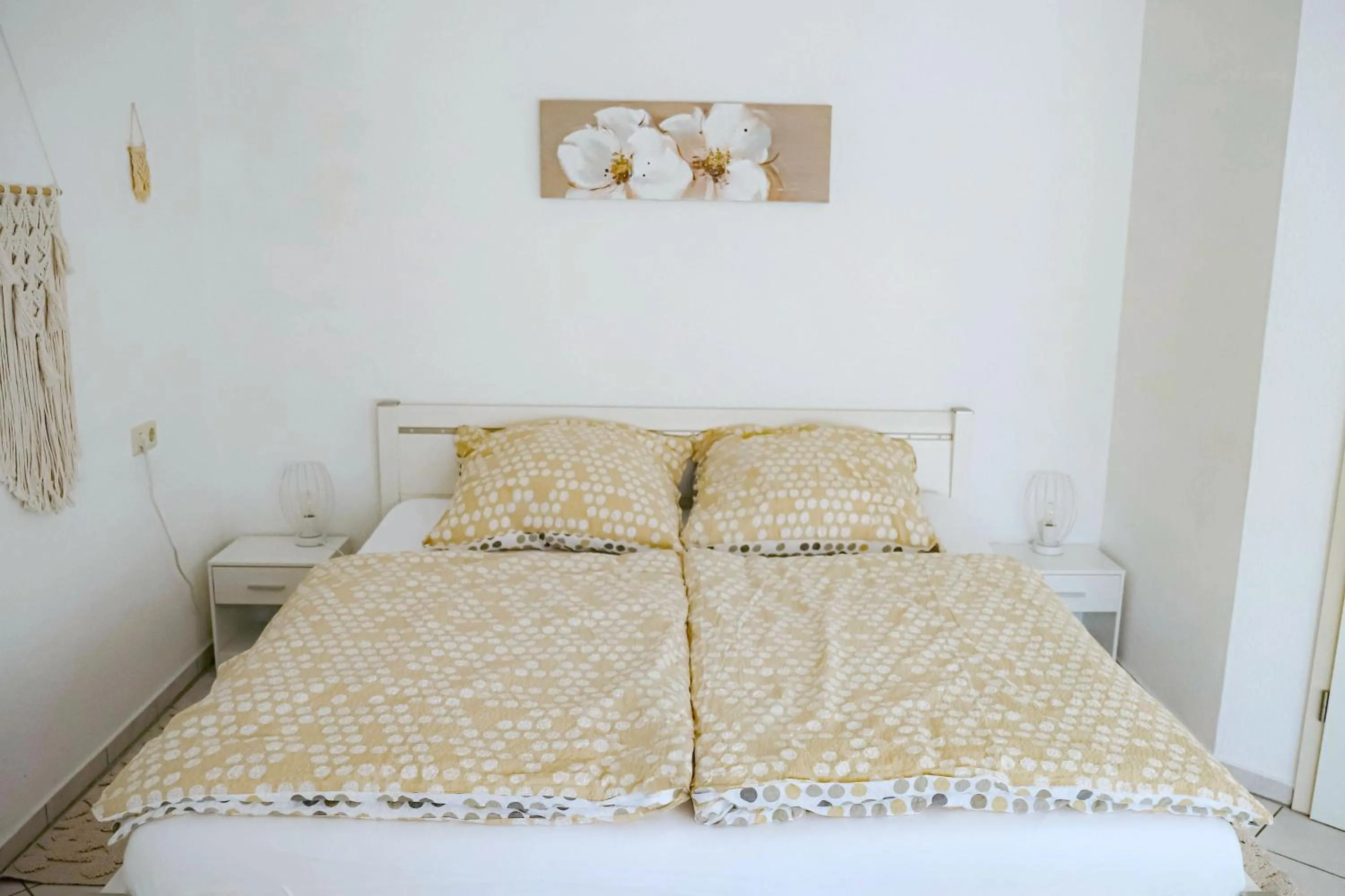 Living room, Bed in Hotel Garni Vitamari