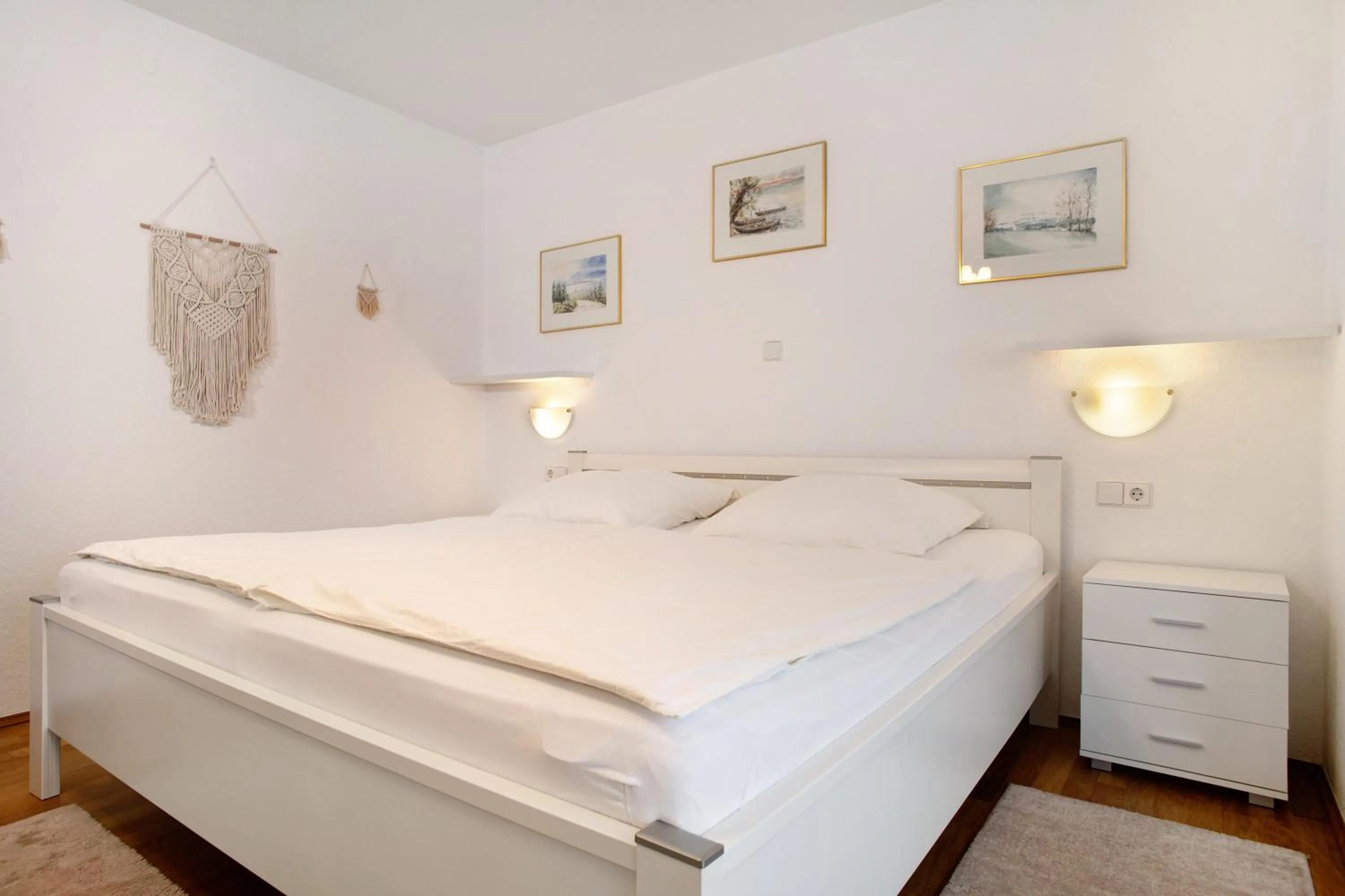 Living room, Bed in Hotel Garni Vitamari