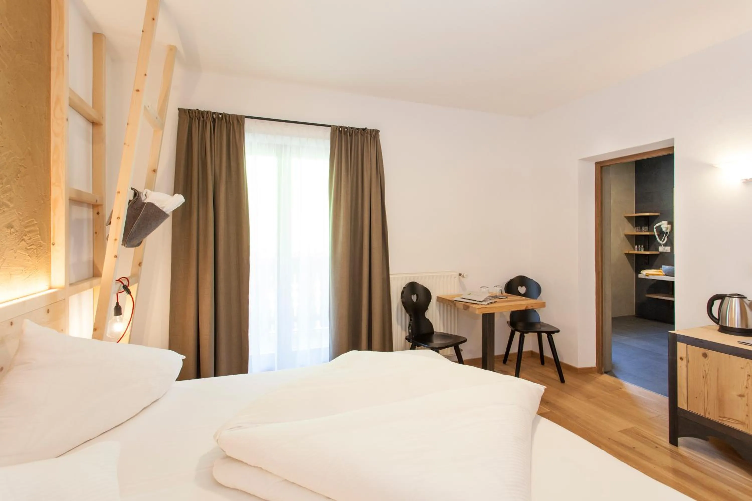 Bed in Hotel-Chalet Pennhof