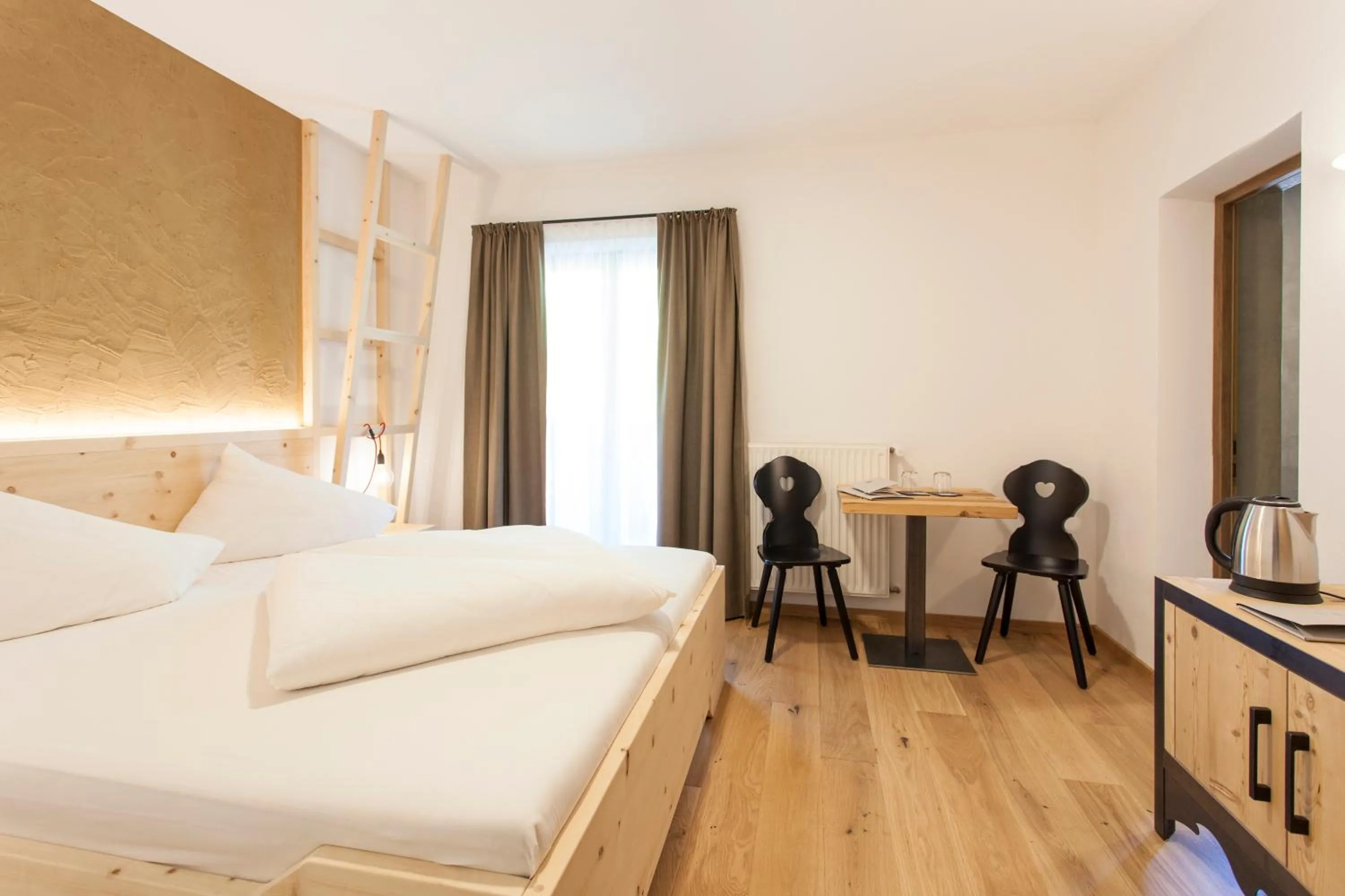 Bed in Hotel-Chalet Pennhof