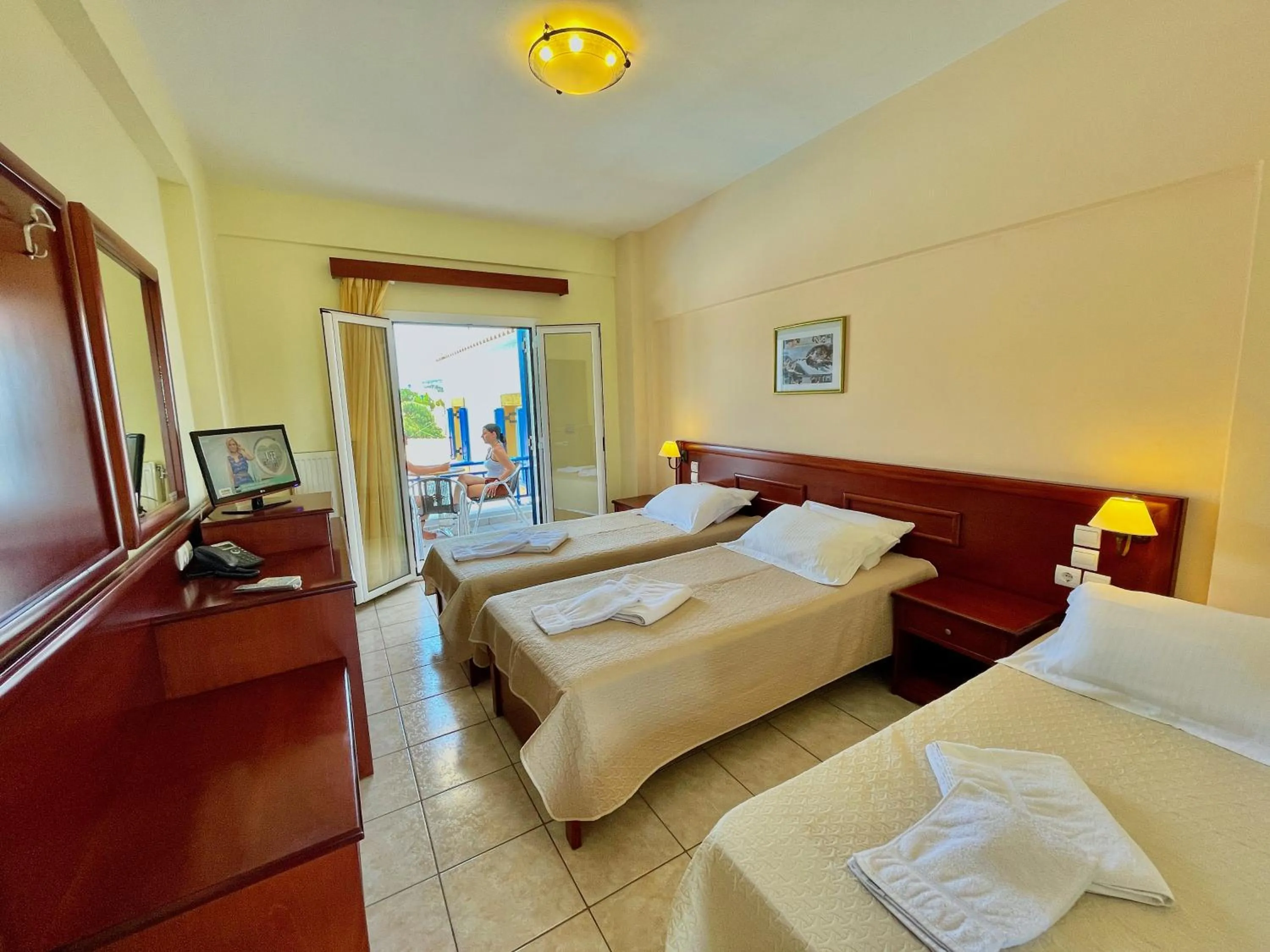 Bed in Venardos Hotel