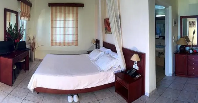 Bed in Venardos Hotel