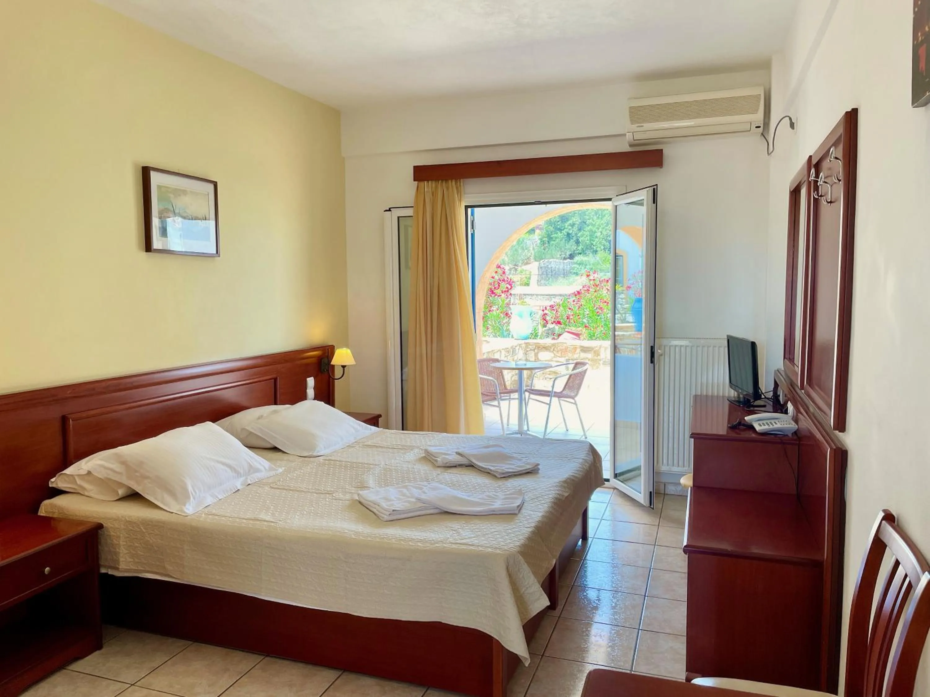 Bed in Venardos Hotel