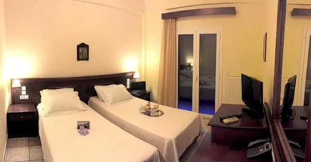 Bed in Venardos Hotel