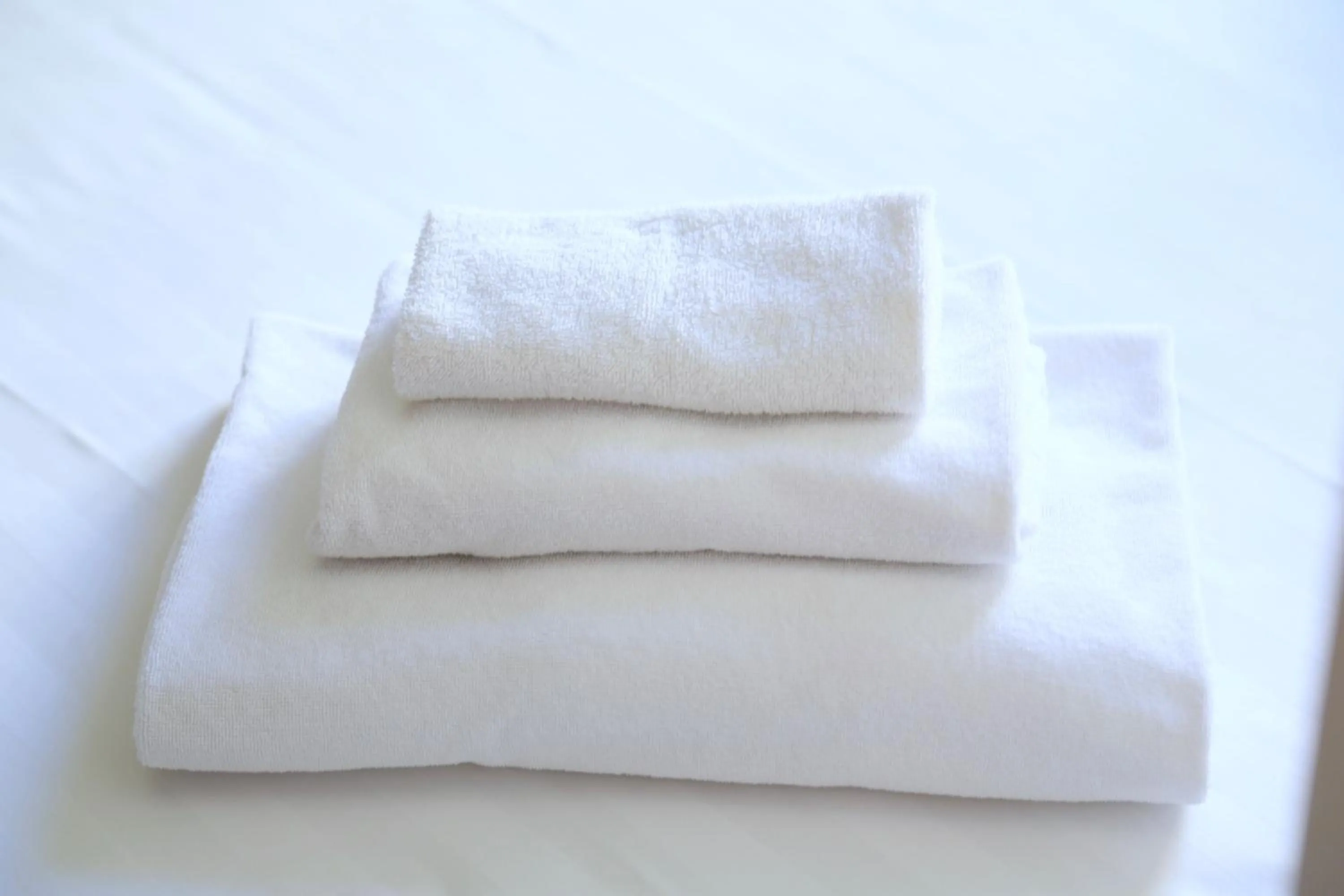 Bed in KISS ME ROME Luxury Rooms