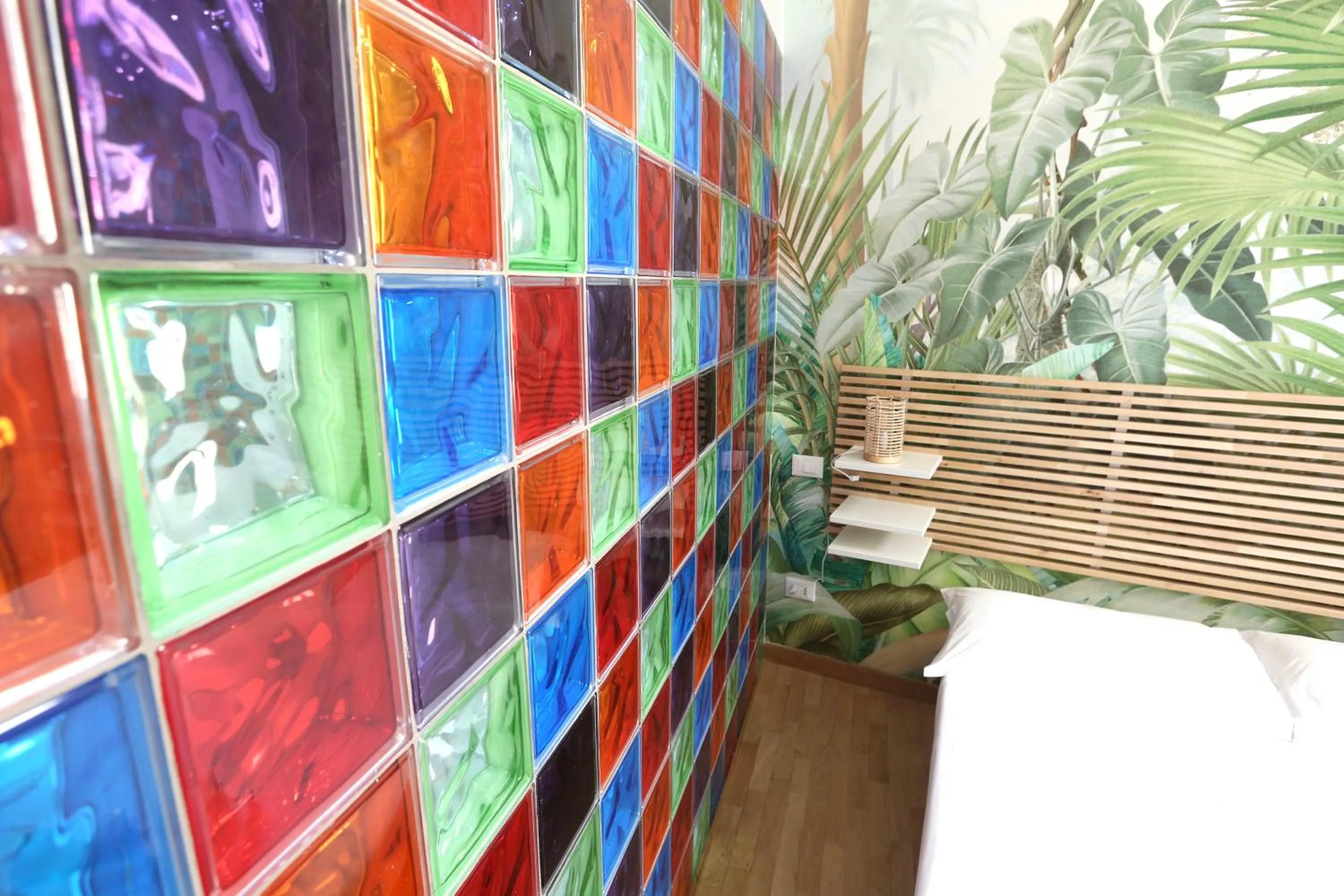 Bed in KISS ME ROME Luxury Rooms