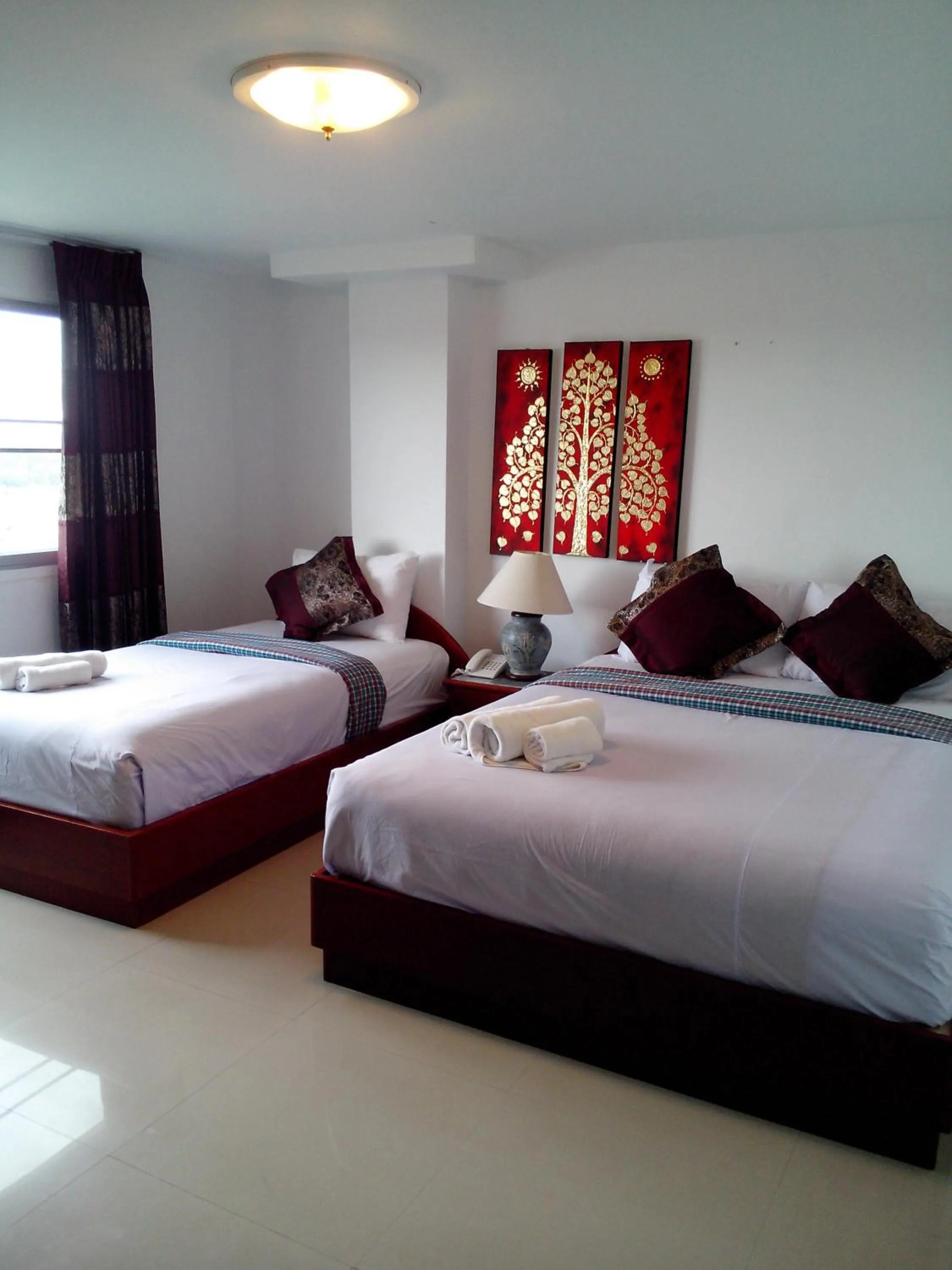 Photo of the whole room, Bed in Regent Lodge Lampang
