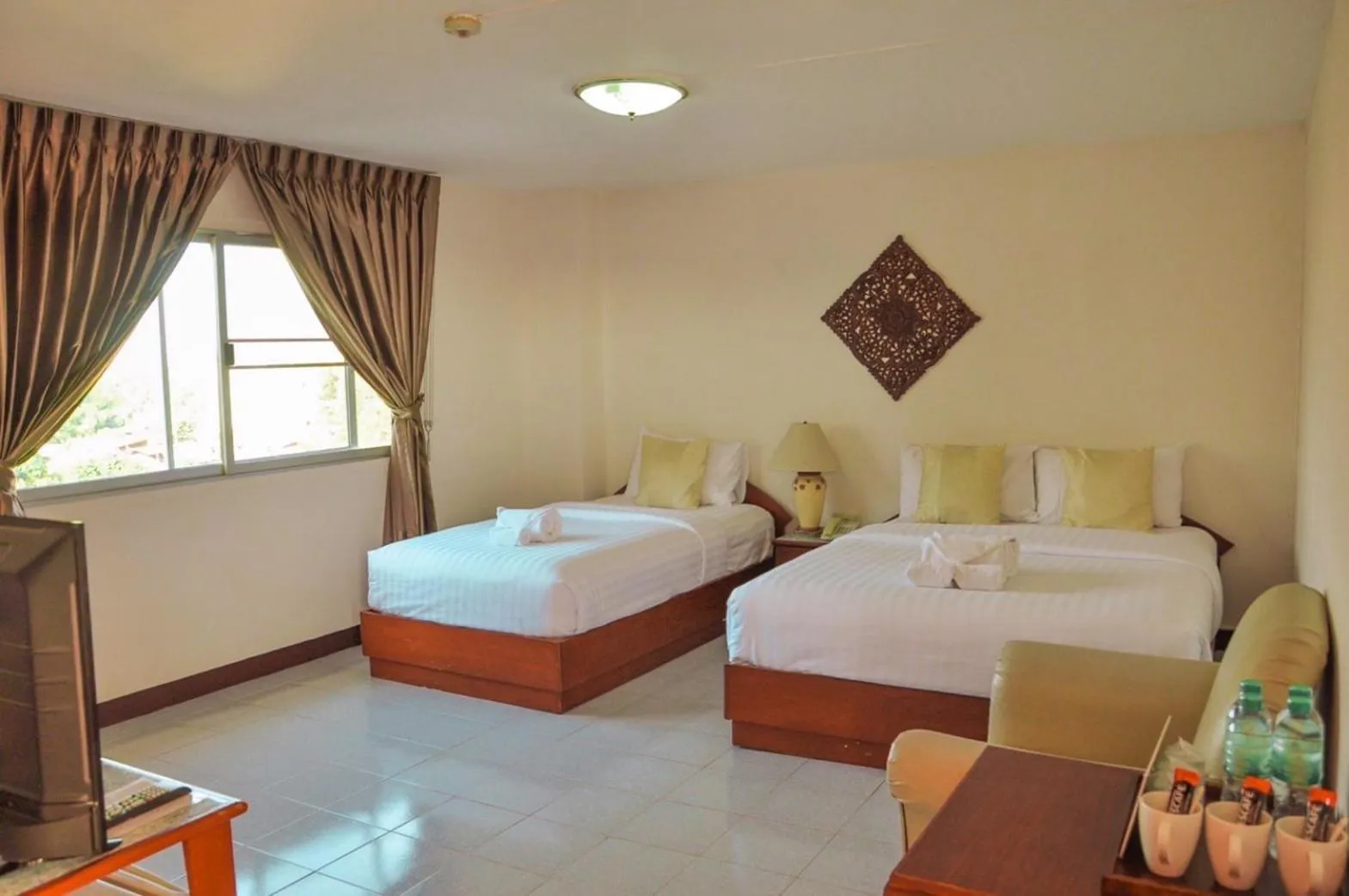 Bed in Regent Lodge Lampang