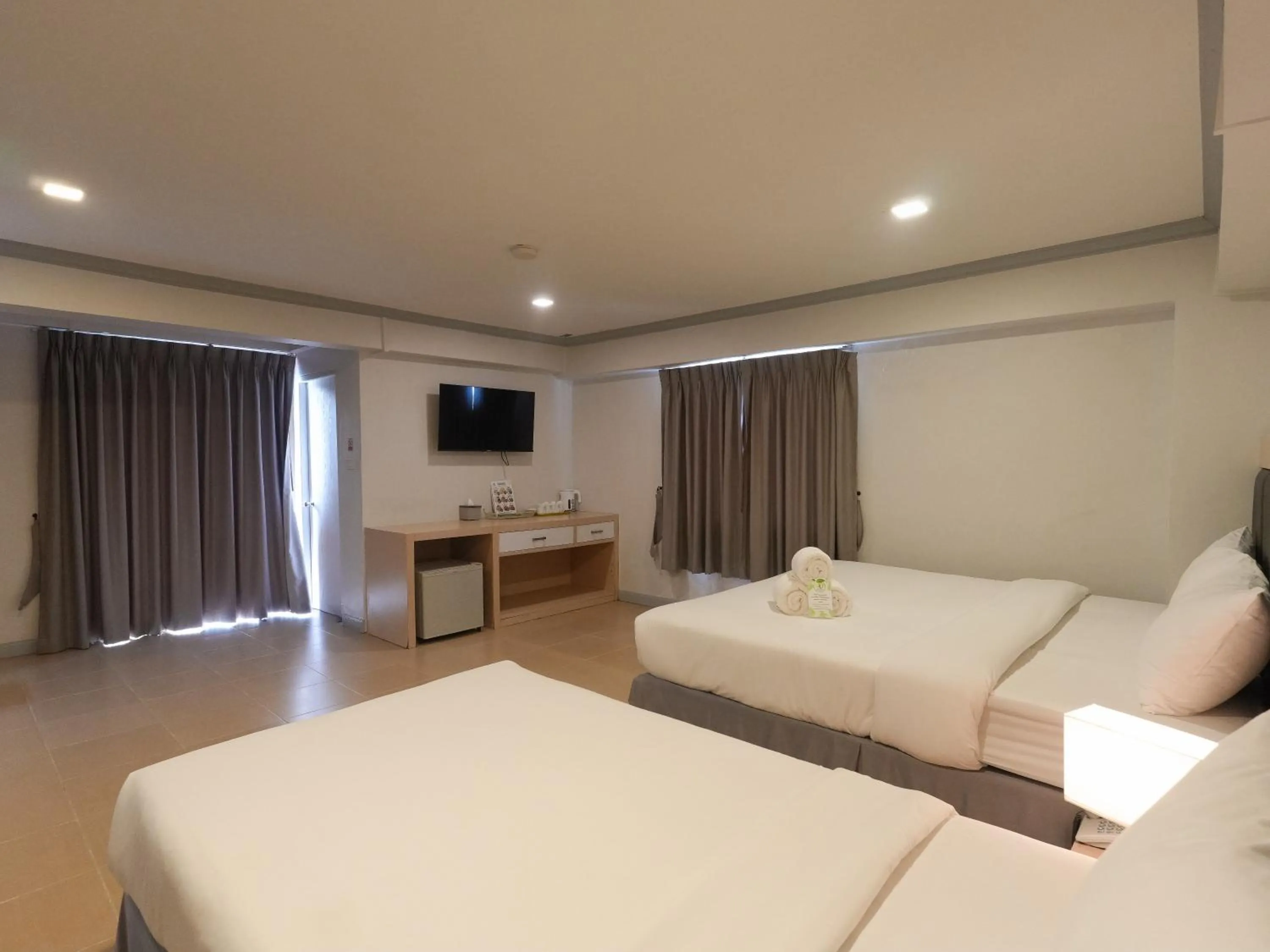 Bed in Regent Ngamwongwan Hotel