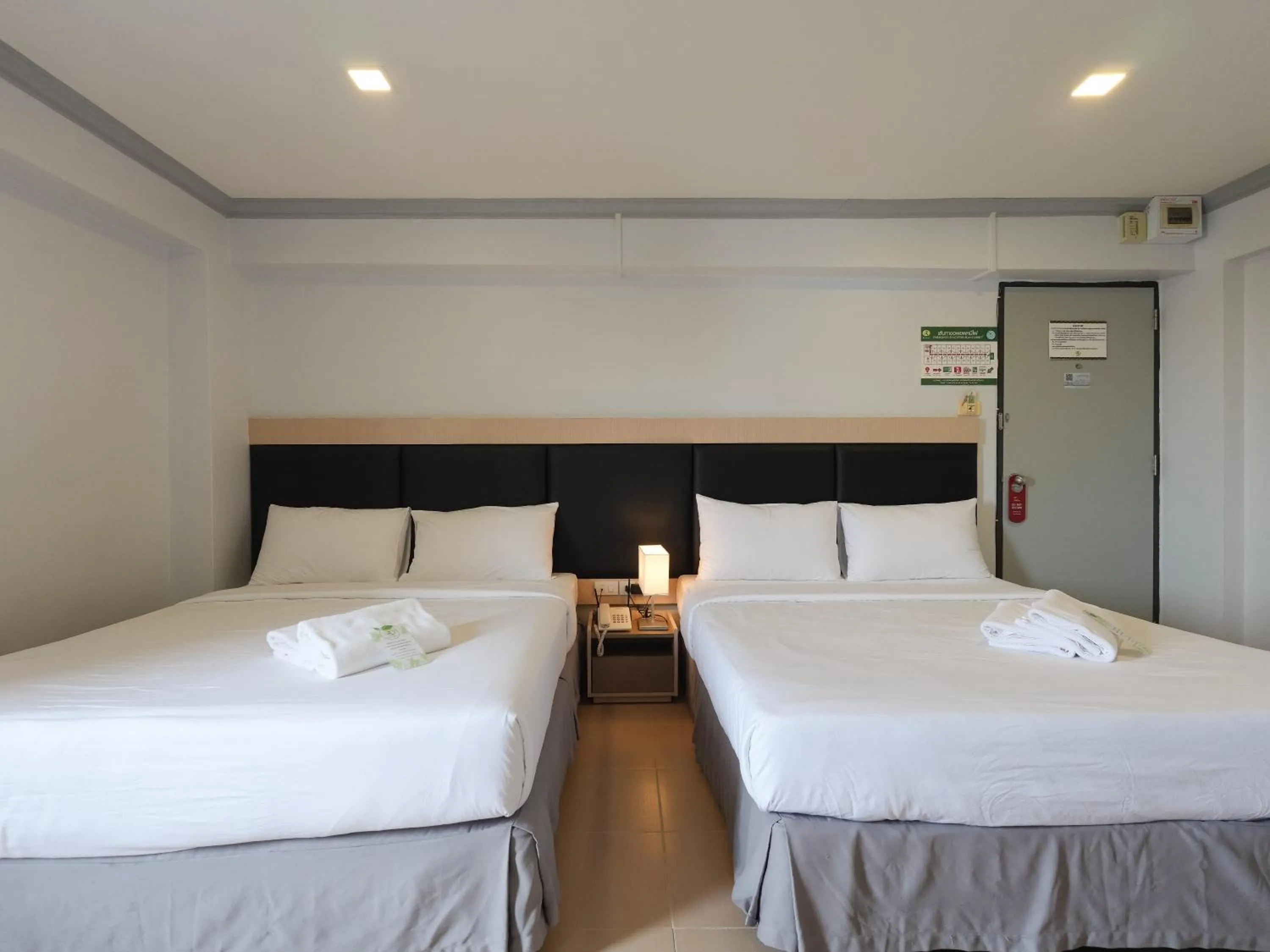 Bed in Regent Ngamwongwan Hotel