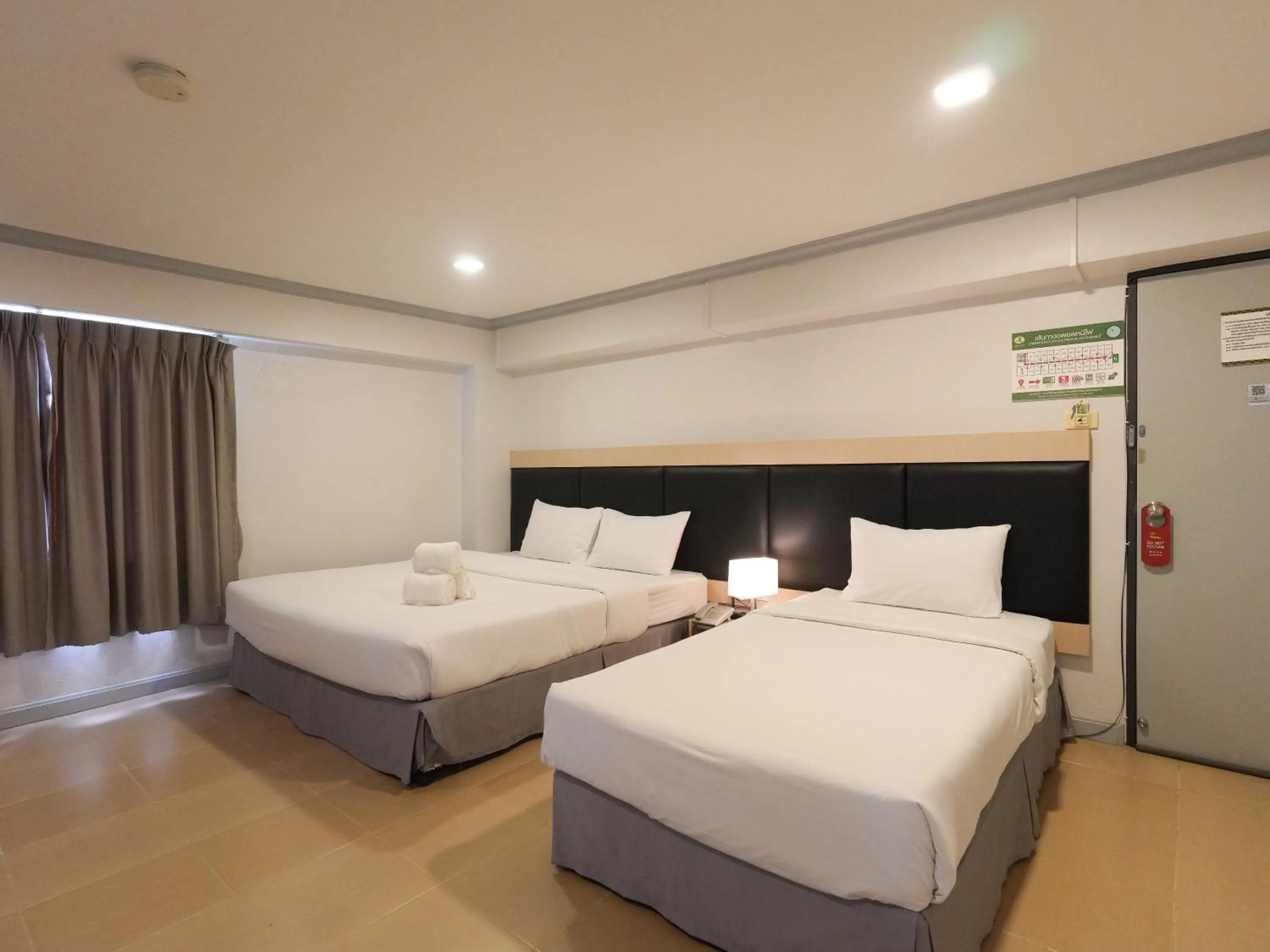 Bed in Regent Ngamwongwan Hotel