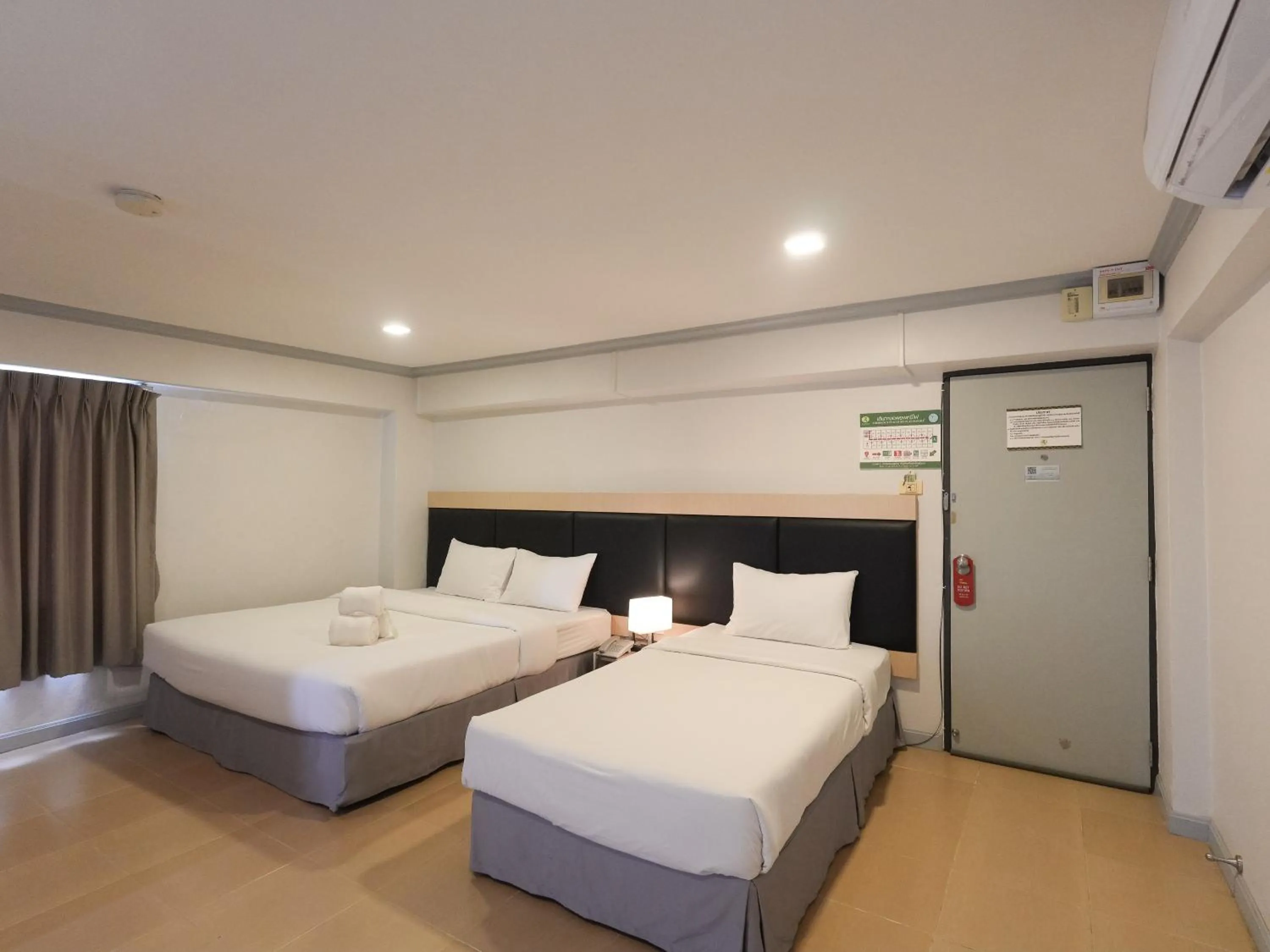 Bed in Regent Ngamwongwan Hotel