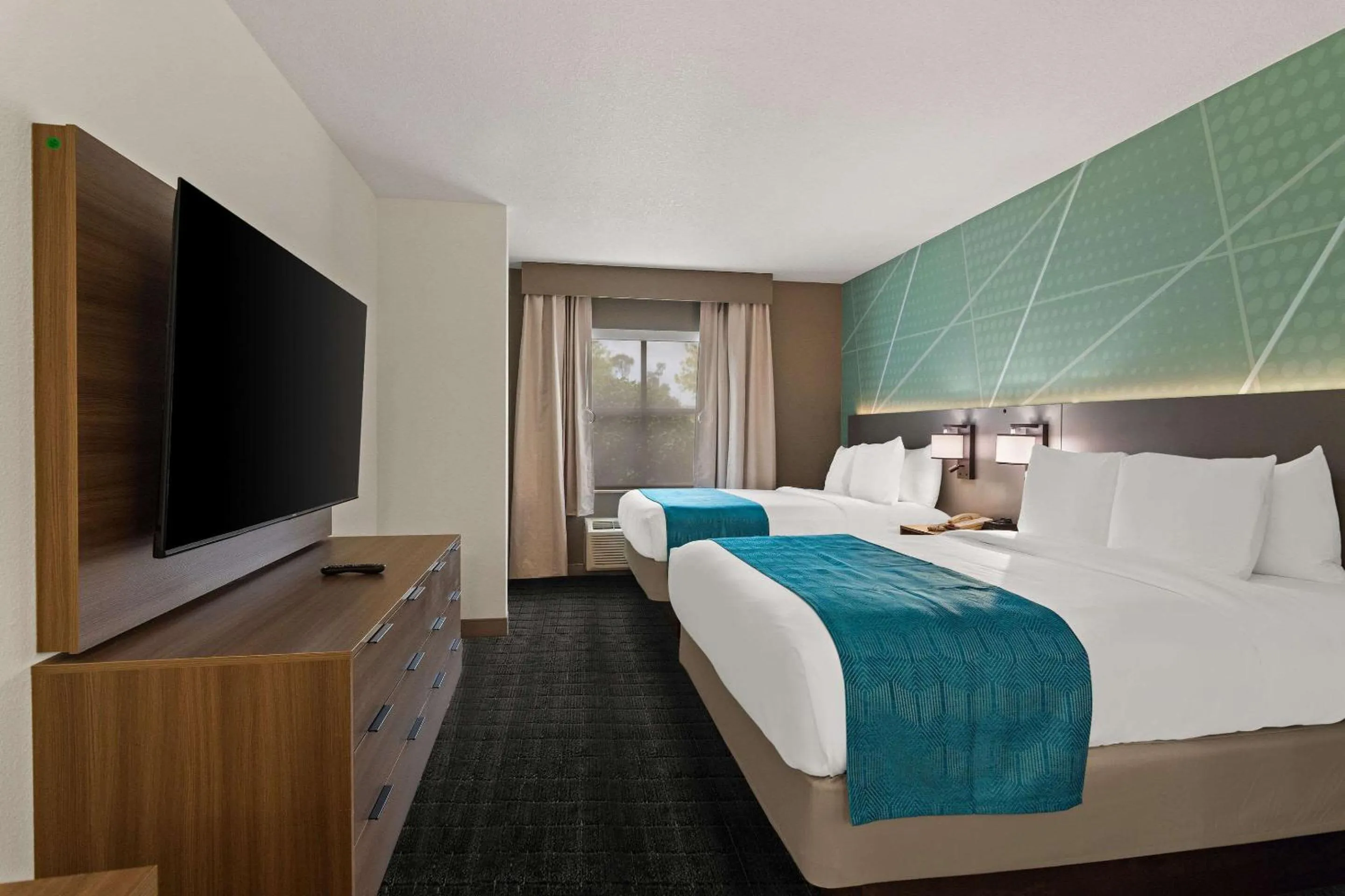 Bedroom, Bed in Comfort Suites Vero Beach I-95